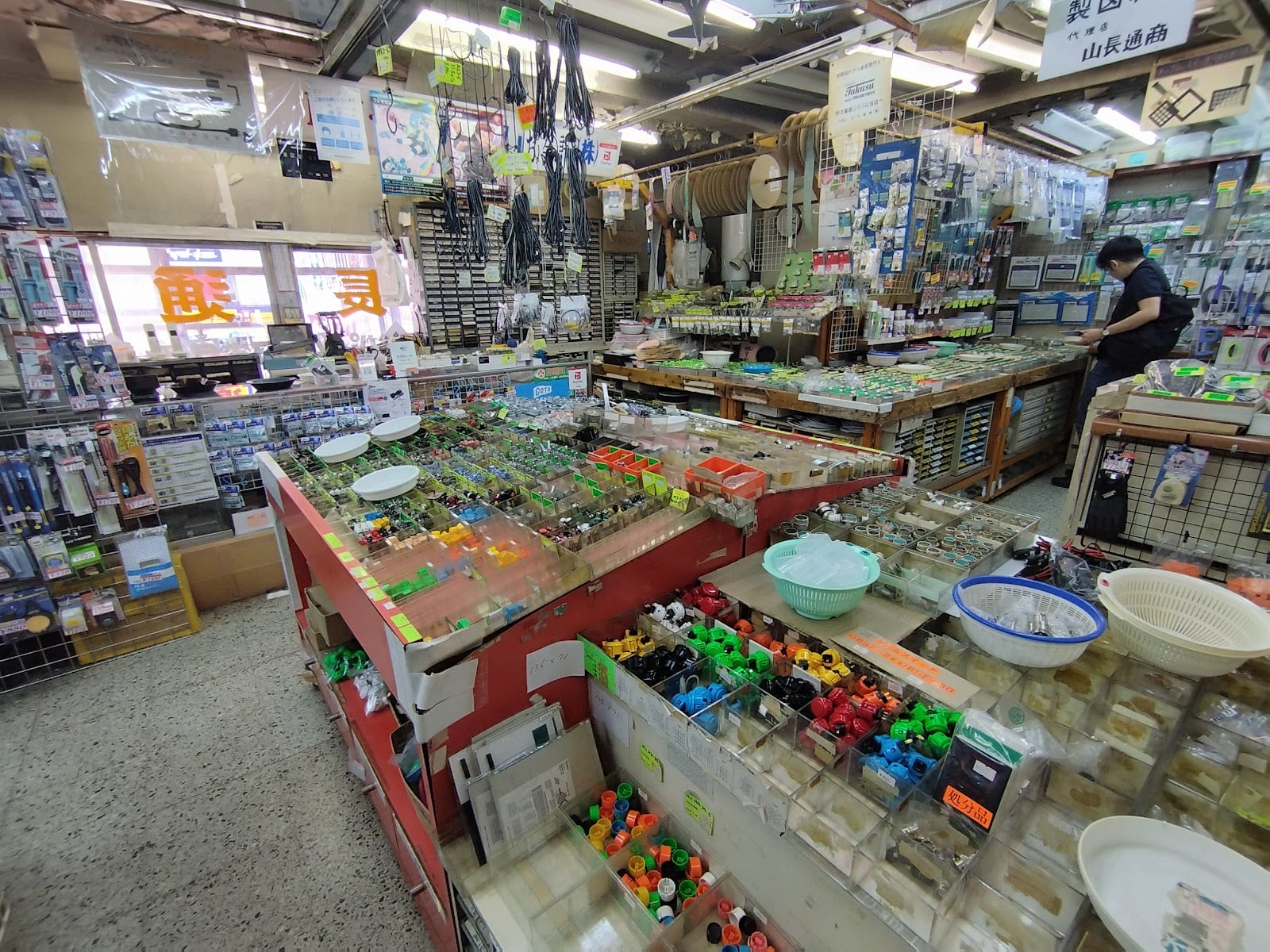 Rows of capsule-toy machines in an Akihabara shop.