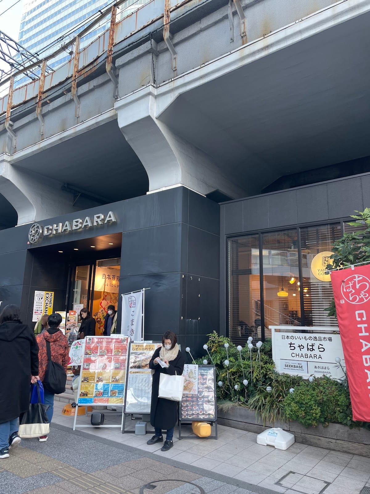 The entrance to the Chabara food market under the tracks.