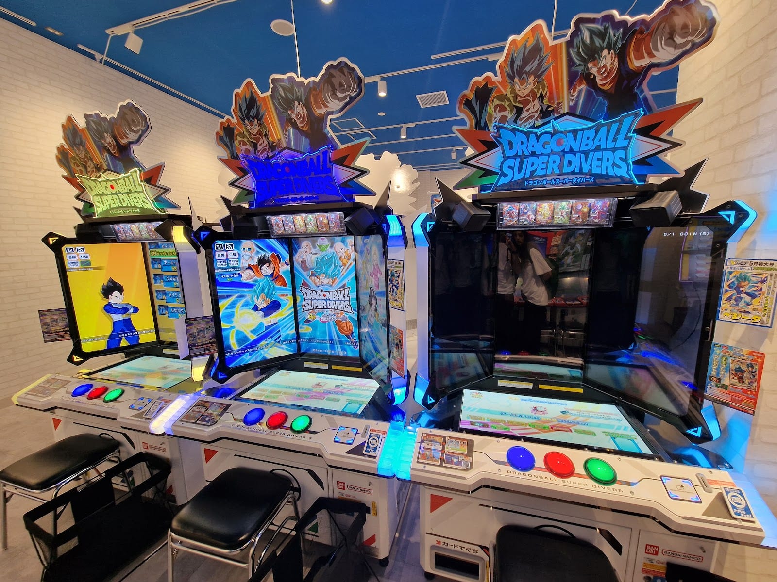 Lit arcade cabinets on a GiGO gaming floor.