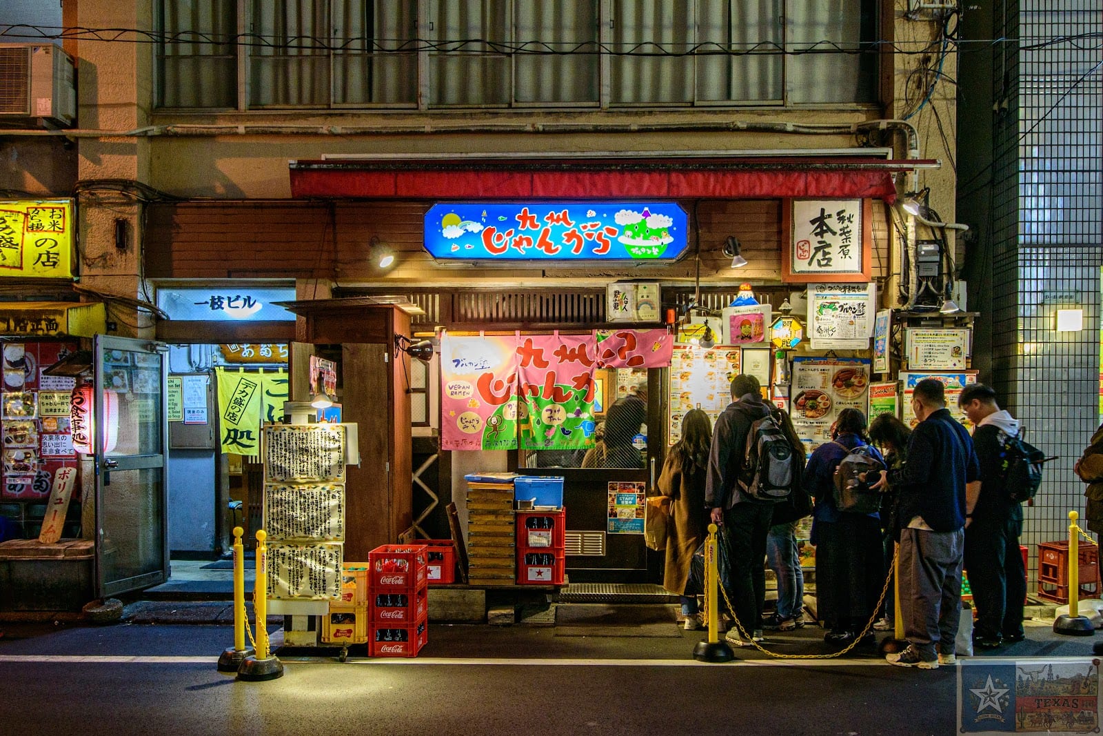 The Kyushu Jangara ramen storefront lit at night.