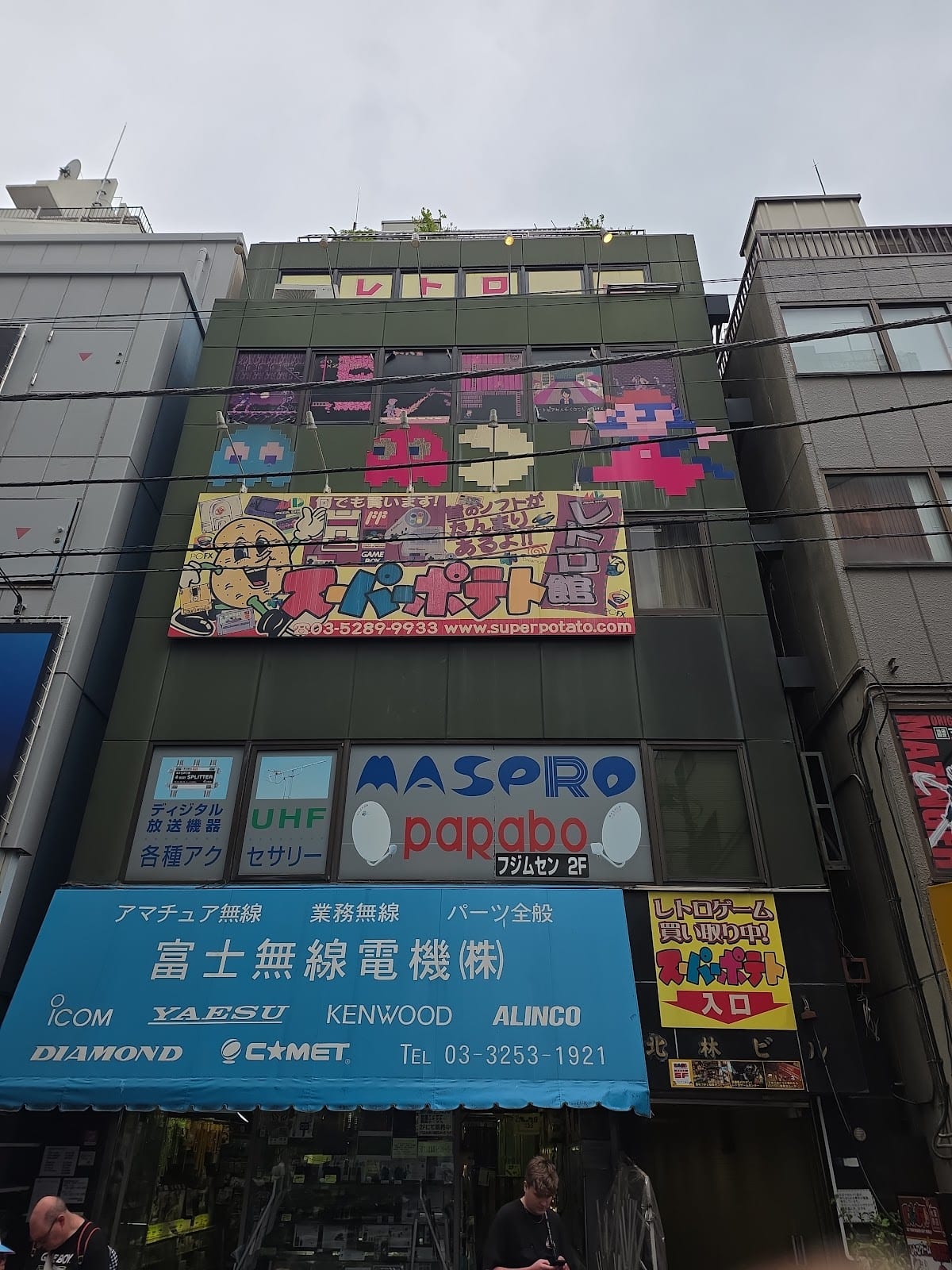 Super Potato's retro-game storefront with pixel-art signage.