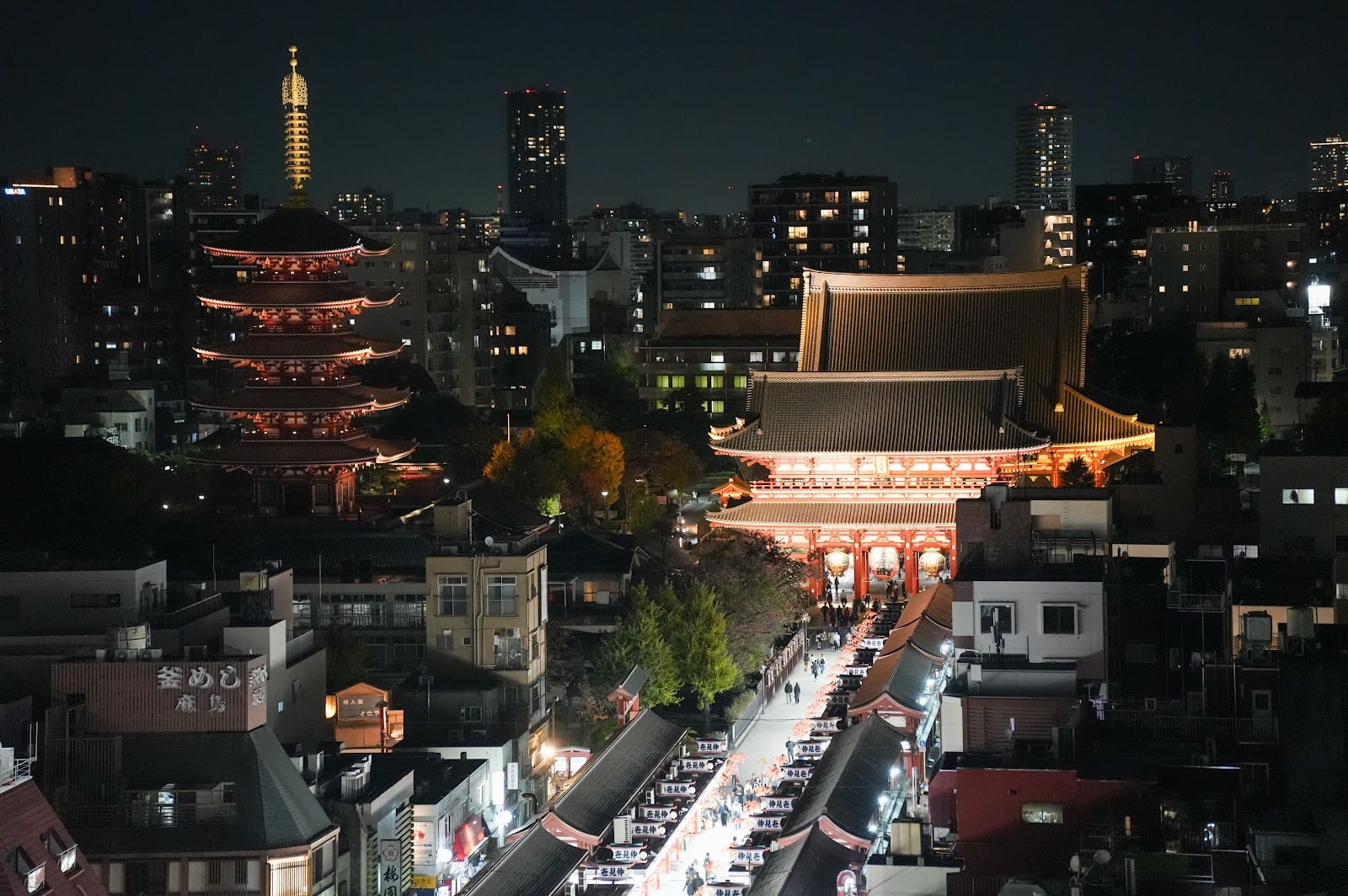 Senso-ji lit up at night, seen from the tourist center's deck.