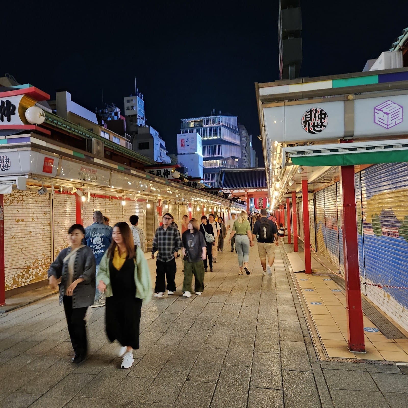 Shoppers along the stalls of Nakamise-dori.
