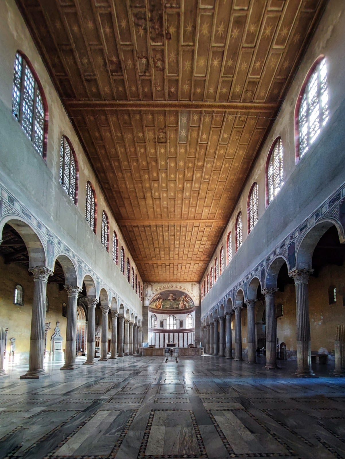 The luminous 5th-century nave and colonnade of Santa Sabina on the Aventine.