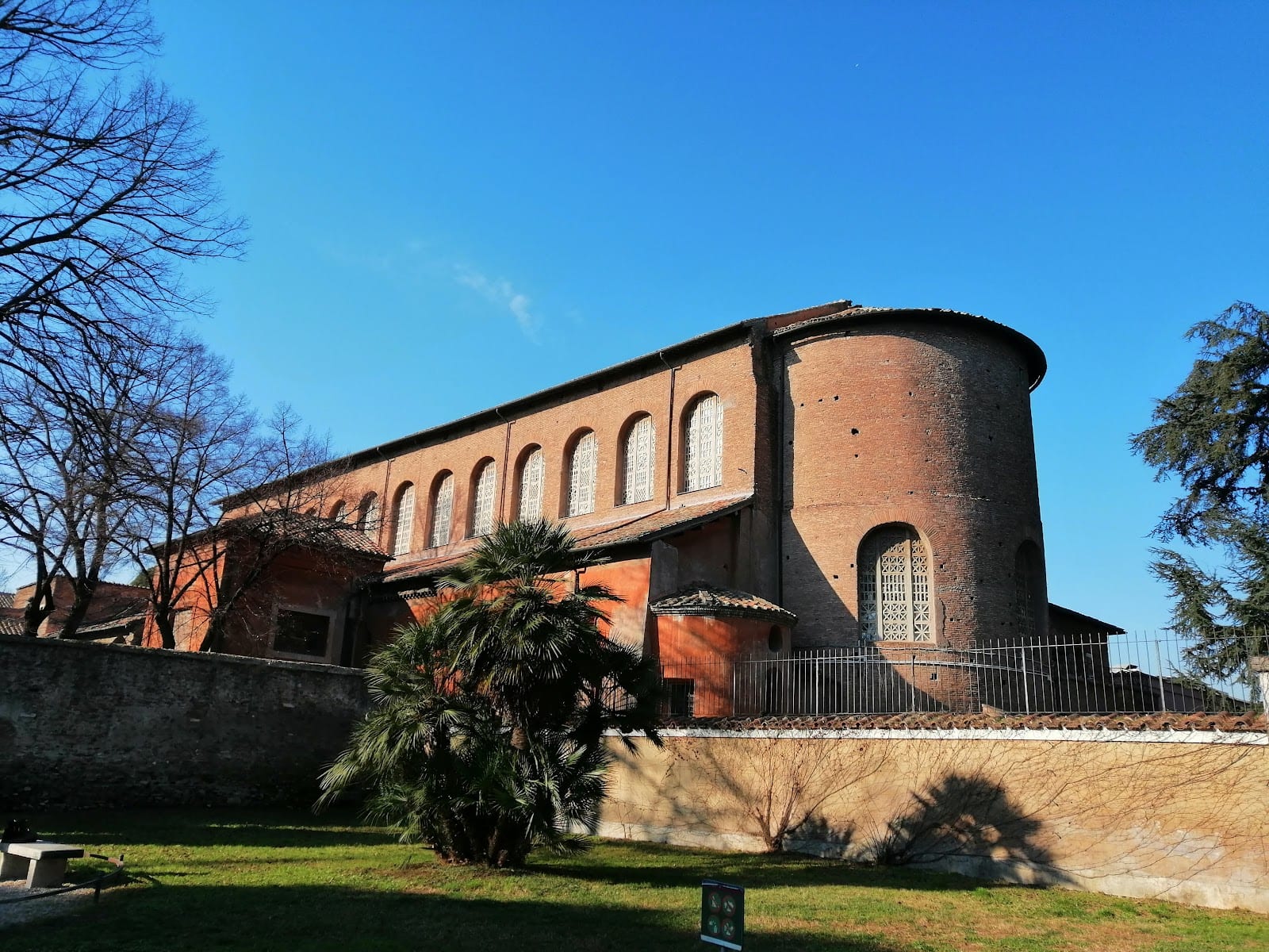 The brick exterior and apse of the early Christian Basilica of Santa Sabina.