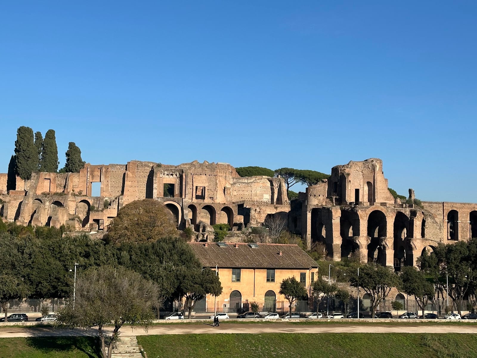 The imperial palace ruins of the Palatine rising above the Circus Maximus.
