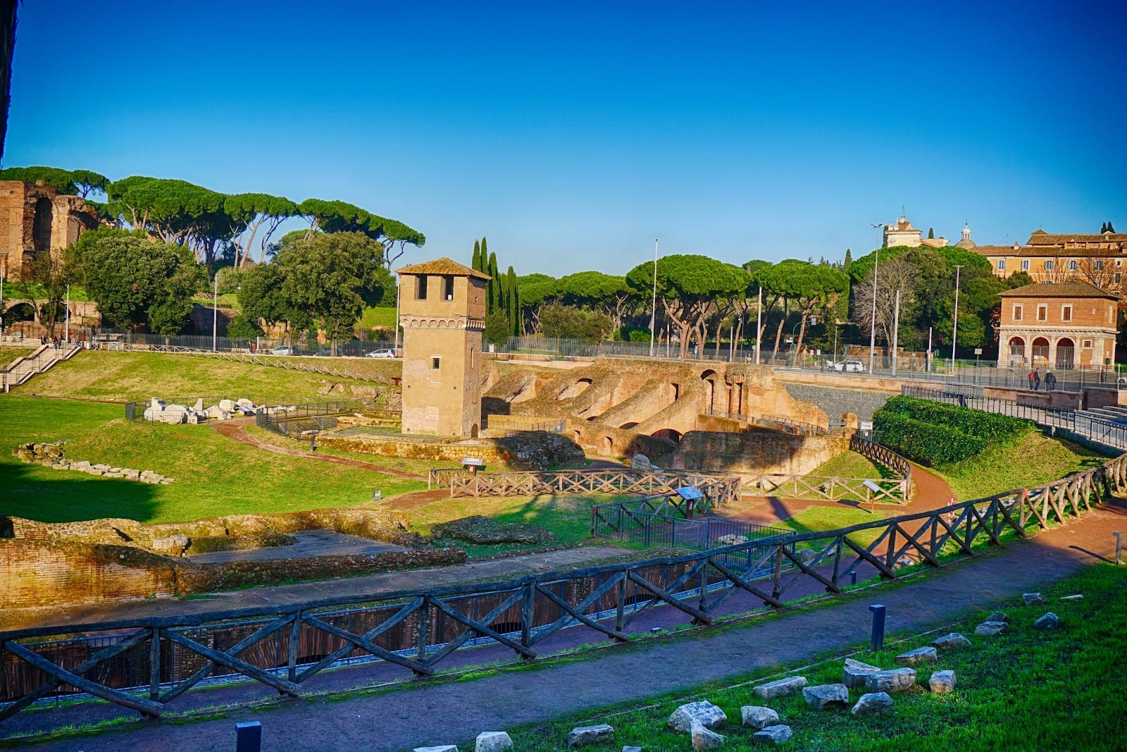 The excavated archaeological area and medieval tower at the curved end of the Circus Maximus.