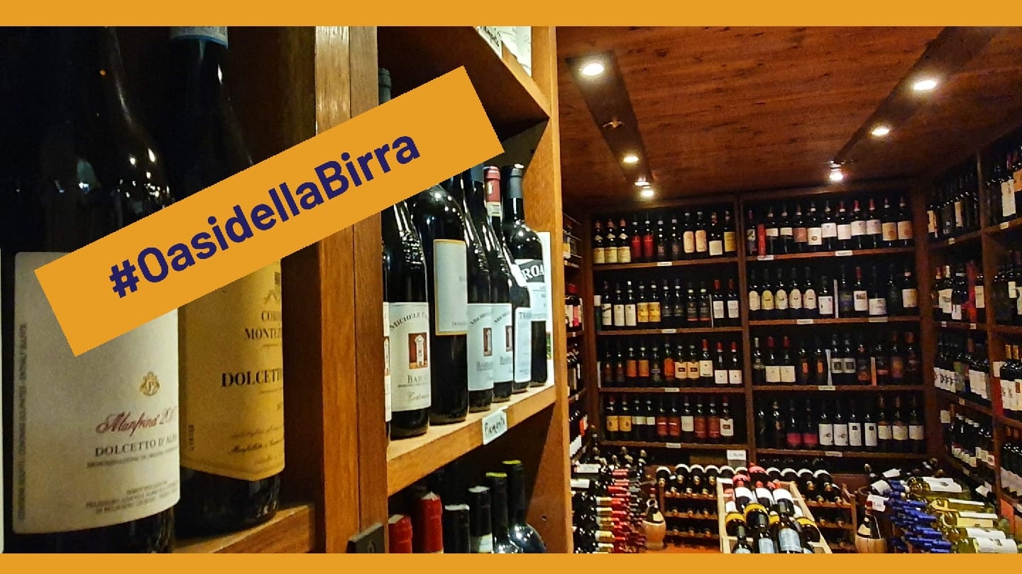 The wine-lined shelves of L'Oasi della Birra in Testaccio.