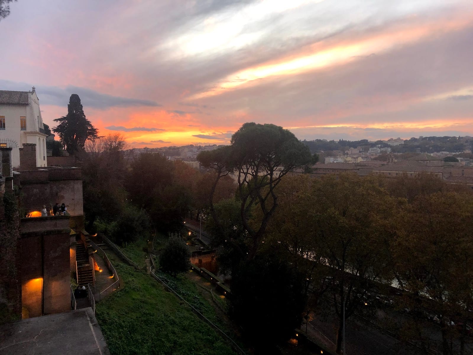 Sunset over Rome's rooftops seen from the belvedere of the Orange Garden.