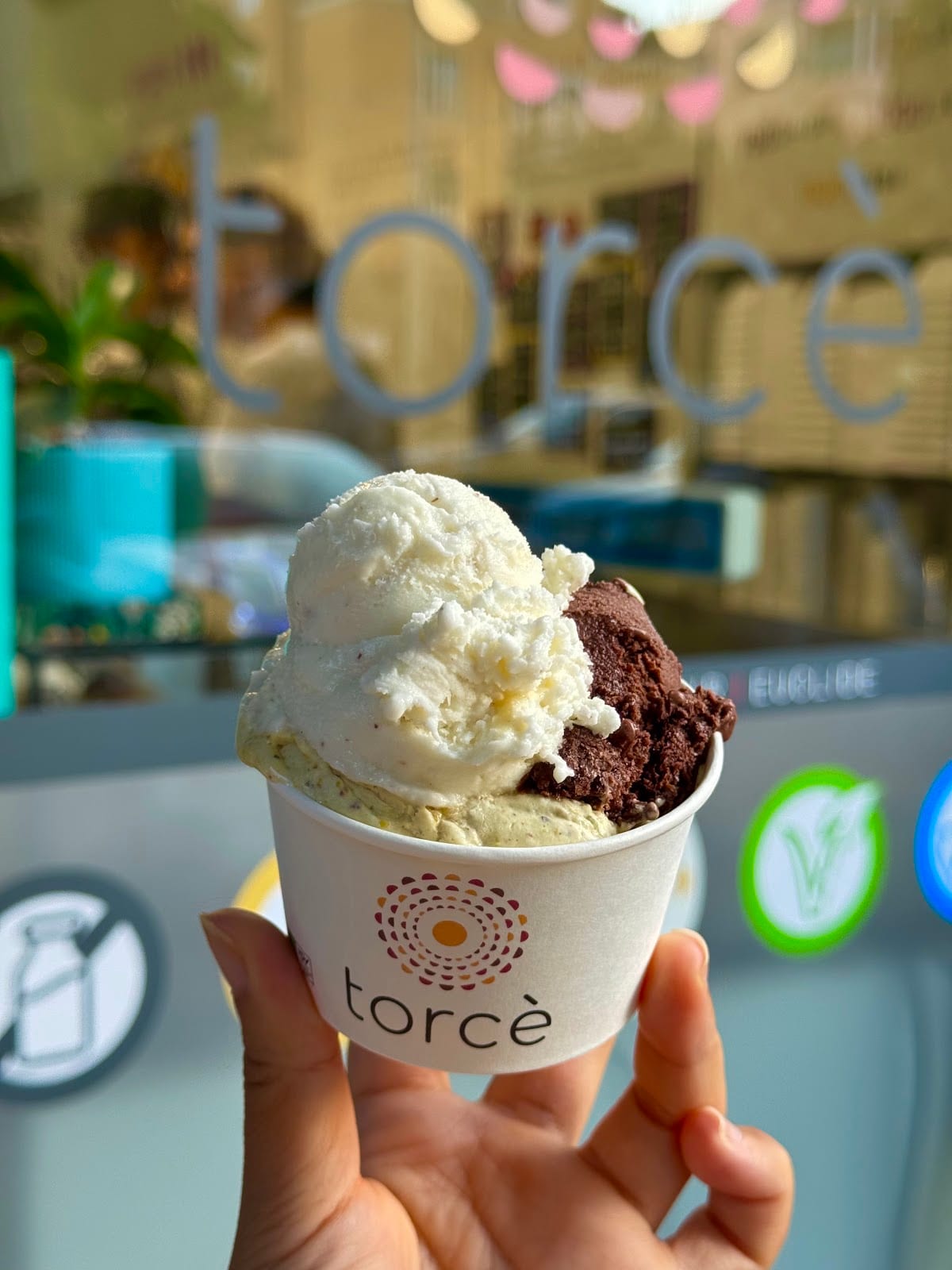 A cup of pistachio and chocolate gelato from Il Gelato di Claudio Torcè.