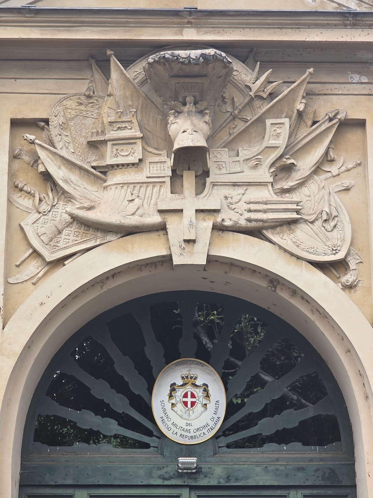 A Piranesi carved relief above the door of the priory church of Santa Maria del Priorato.