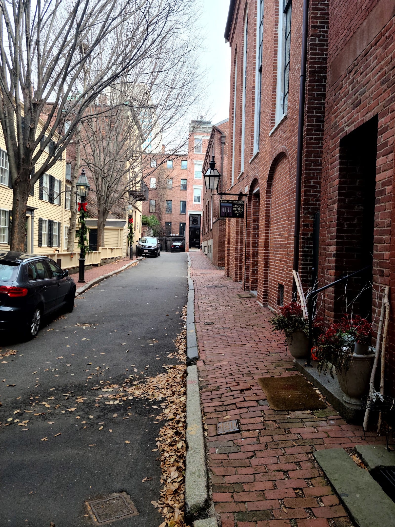 Beacon Hill's brick row houses and gas-lit streets.