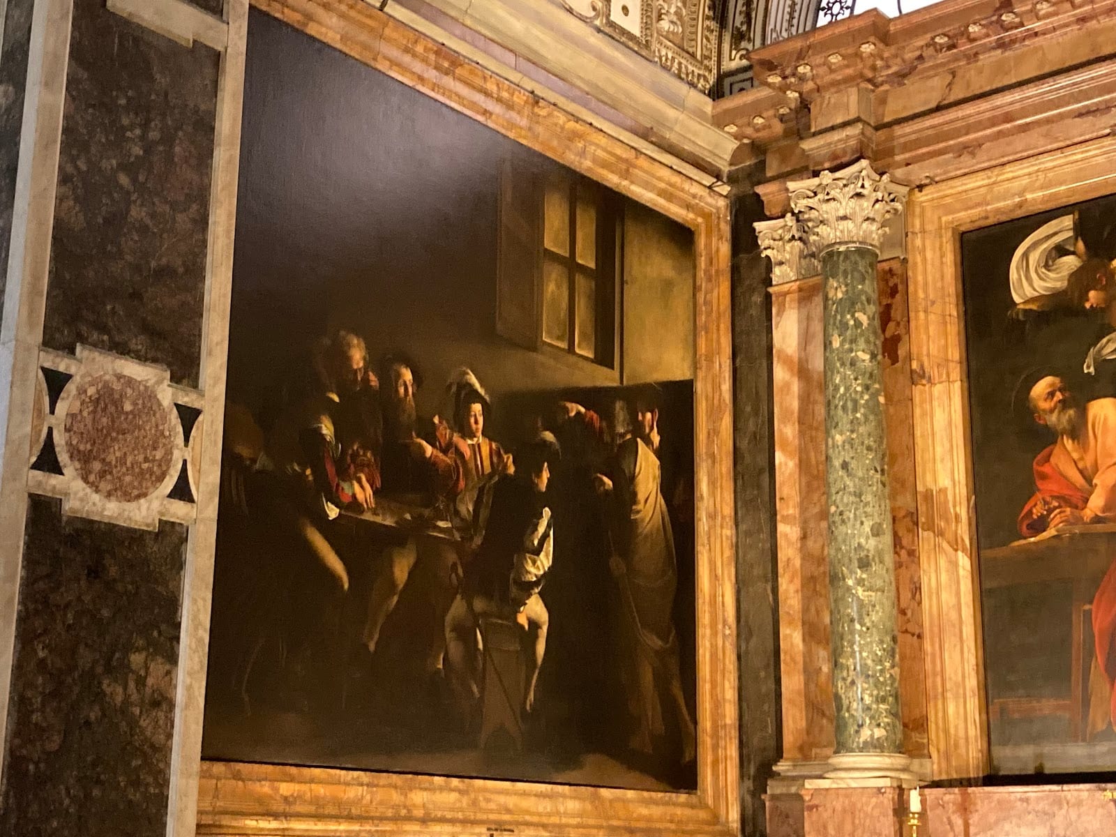 Caravaggio's Calling of Saint Matthew in the Contarelli Chapel of San Luigi dei Francesi.