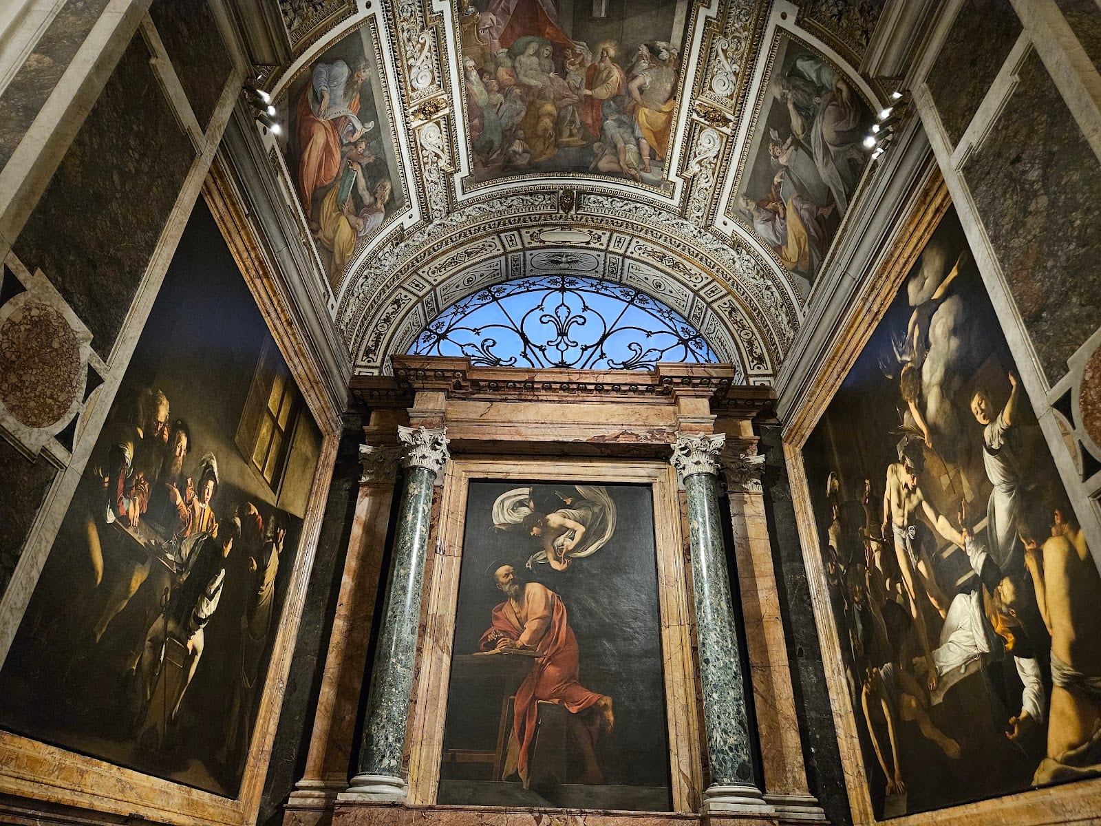 Caravaggio's St Matthew cycle on the walls of the Contarelli Chapel.