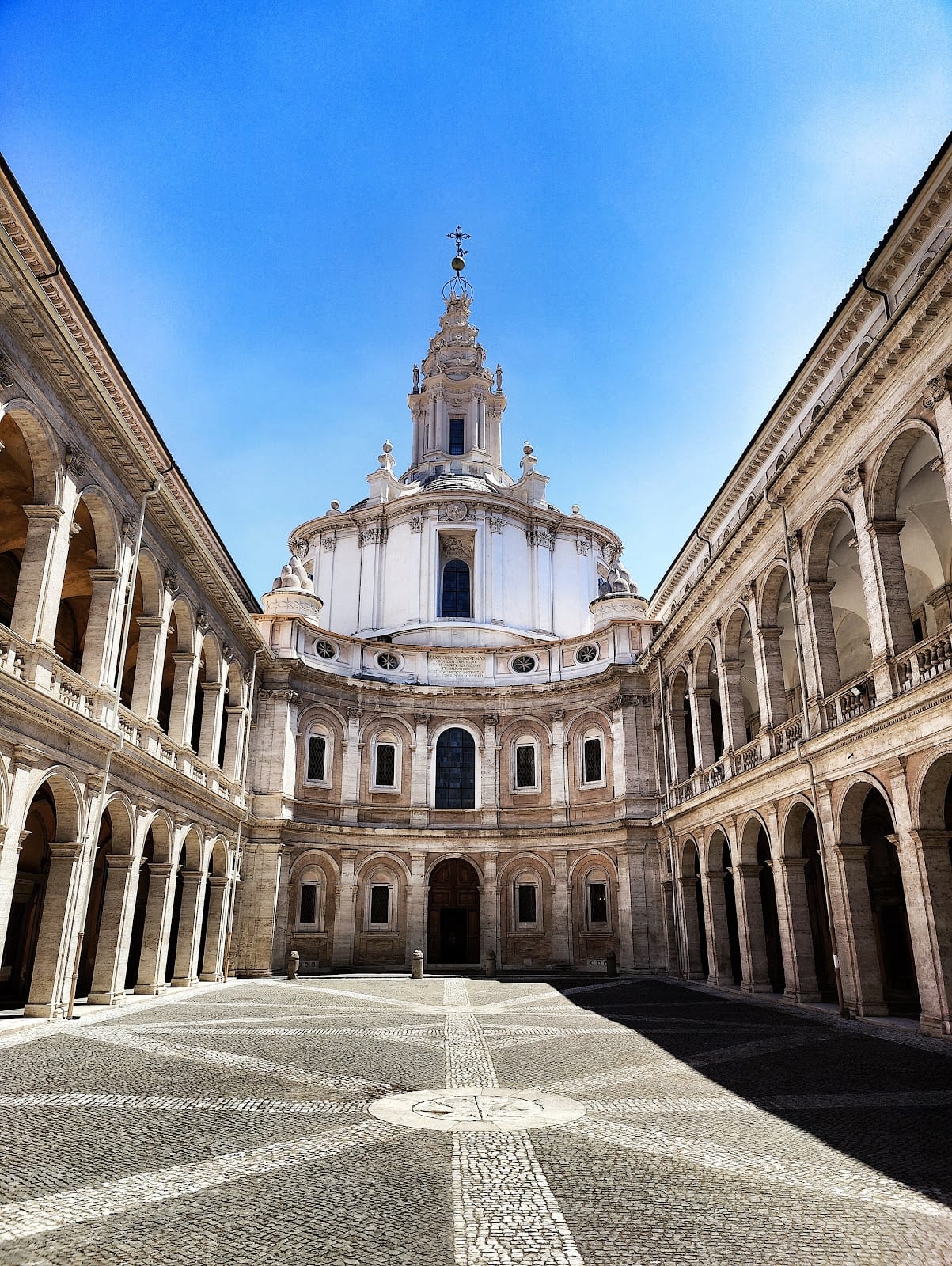 Borromini's spiral corkscrew lantern rising over the courtyard of Sant'Ivo alla Sapienza.