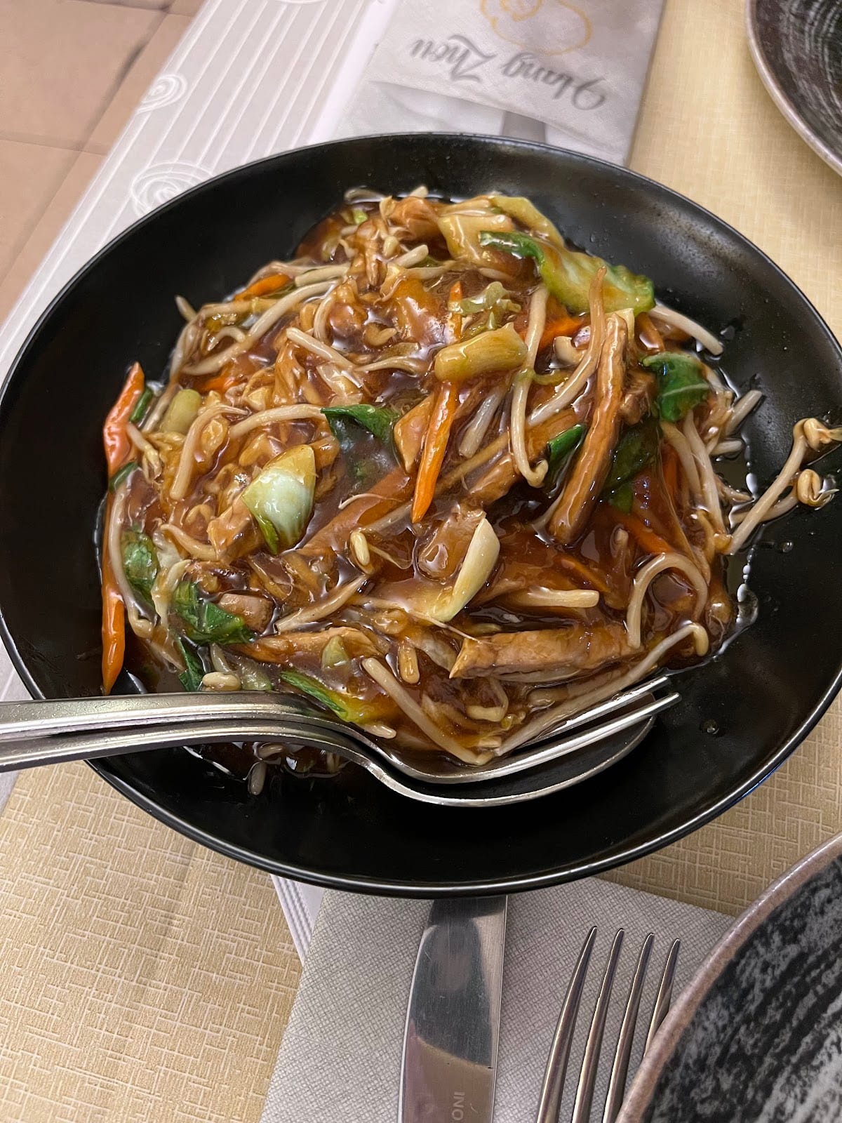 A wok stir-fry of noodles and vegetables at Hang Zhou da Sonia.