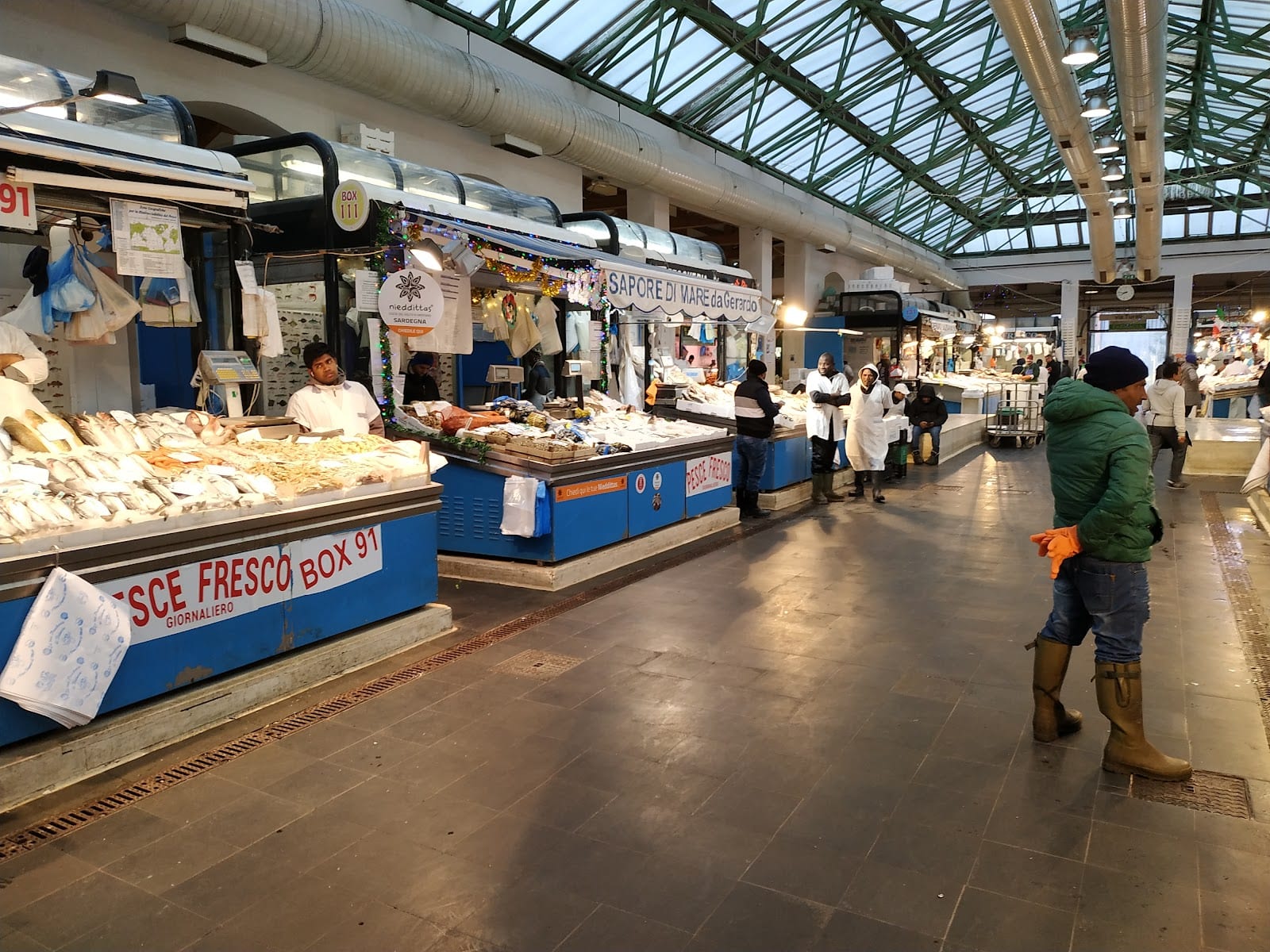 The fresh-fish counters under the glass roof of the Nuovo Mercato Esquilino.