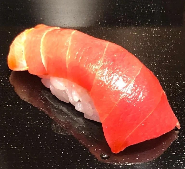 A piece of fatty-tuna nigiri at Kyubey.