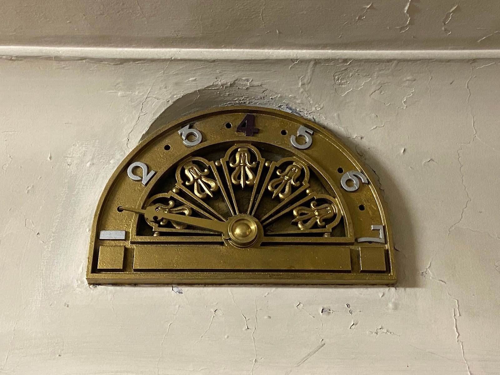 The Art Deco floor dial above the Okuno Building's old elevator.