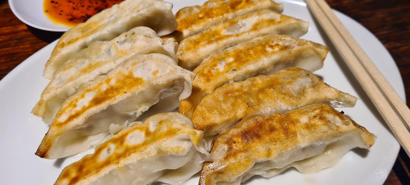 A plate of crisp grilled gyoza at Harajuku Gyozaro.