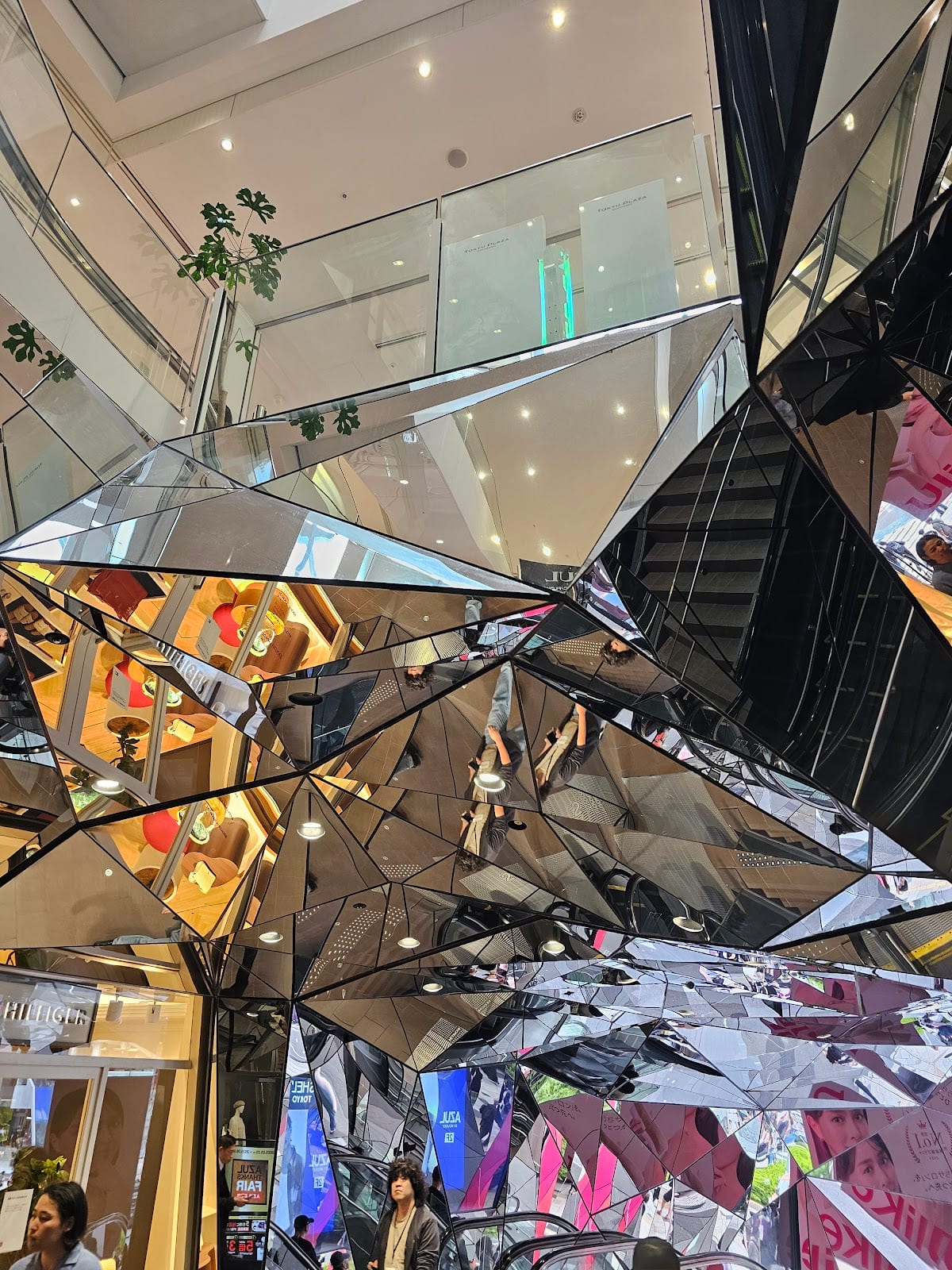The mirror-clad kaleidoscope entrance at Tokyu Plaza Omotesando.