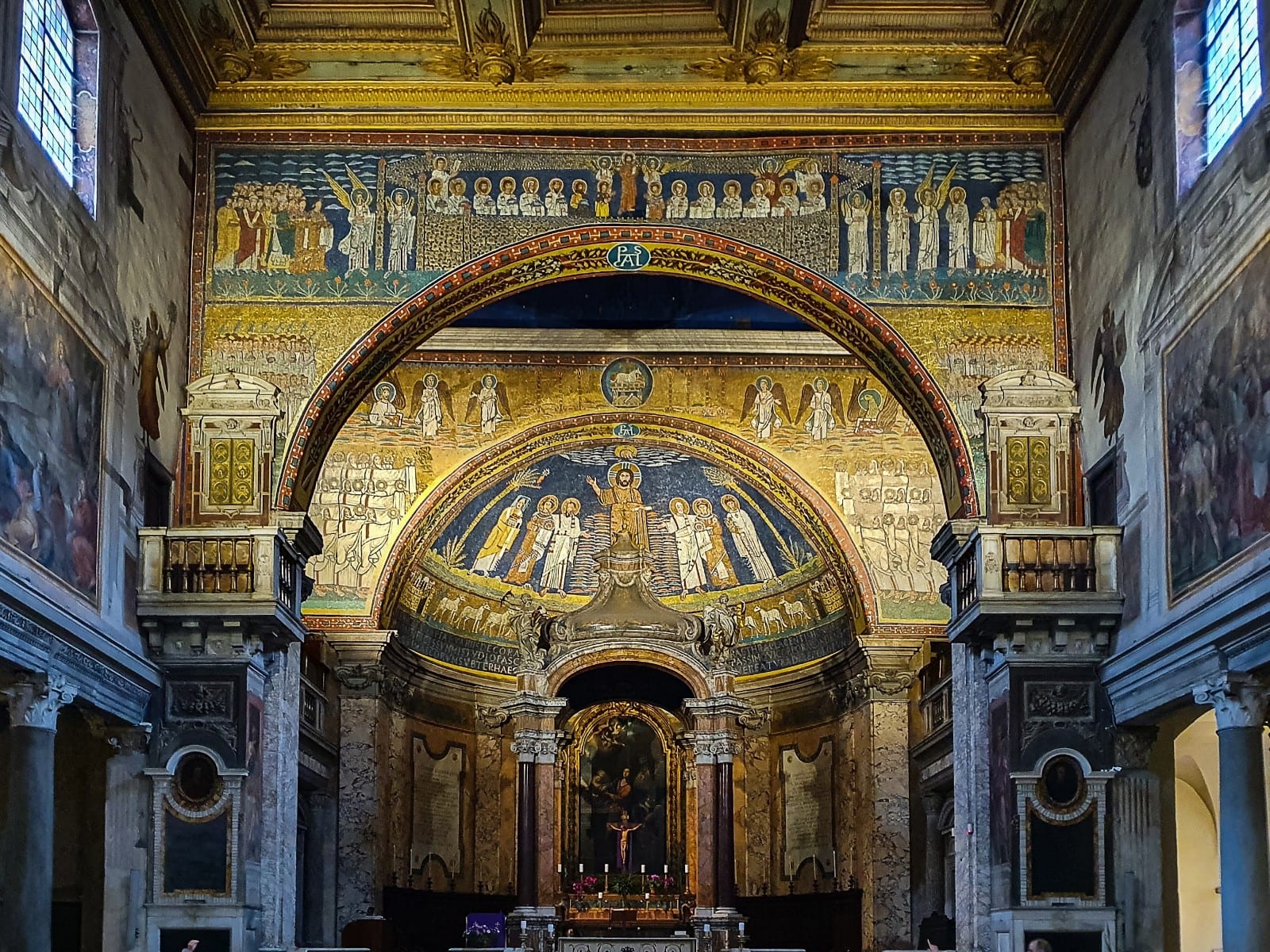 The gold Byzantine apse and triumphal-arch mosaics of Santa Prassede.