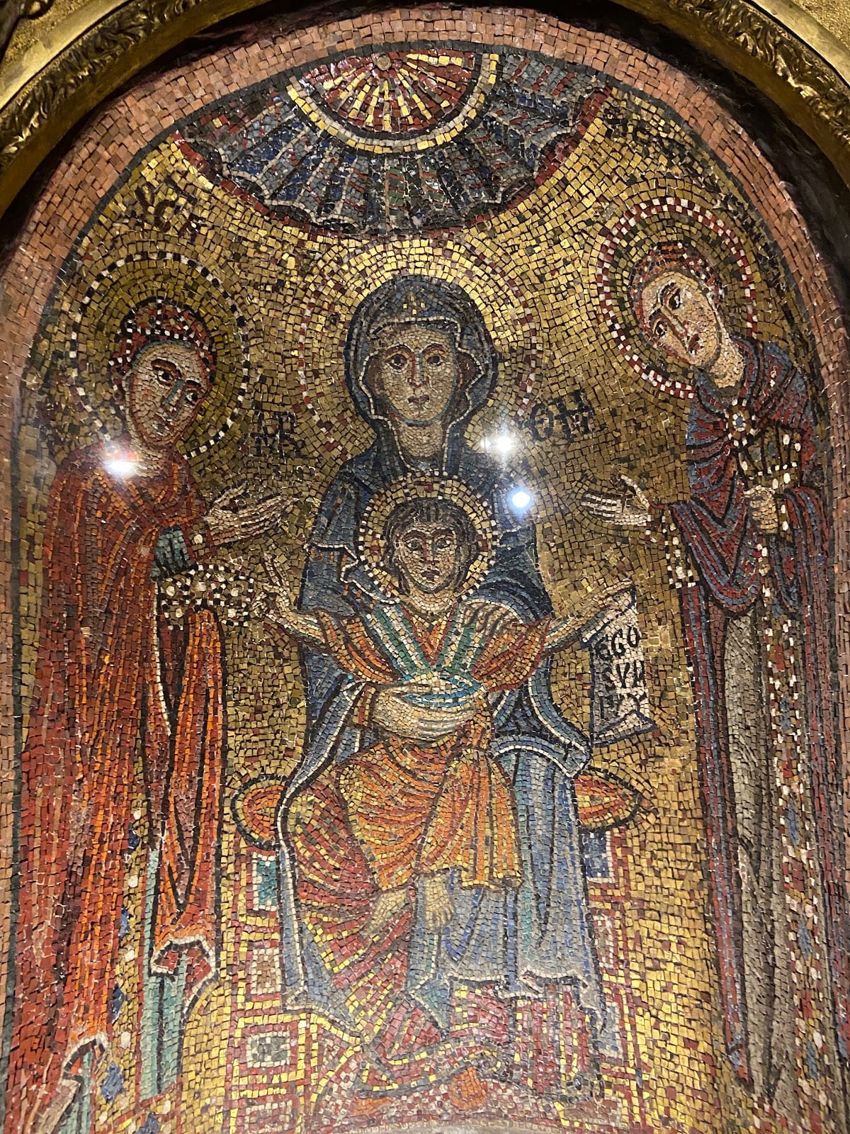A close view of the Byzantine mosaics of the Virgin and saints at Santa Prassede.