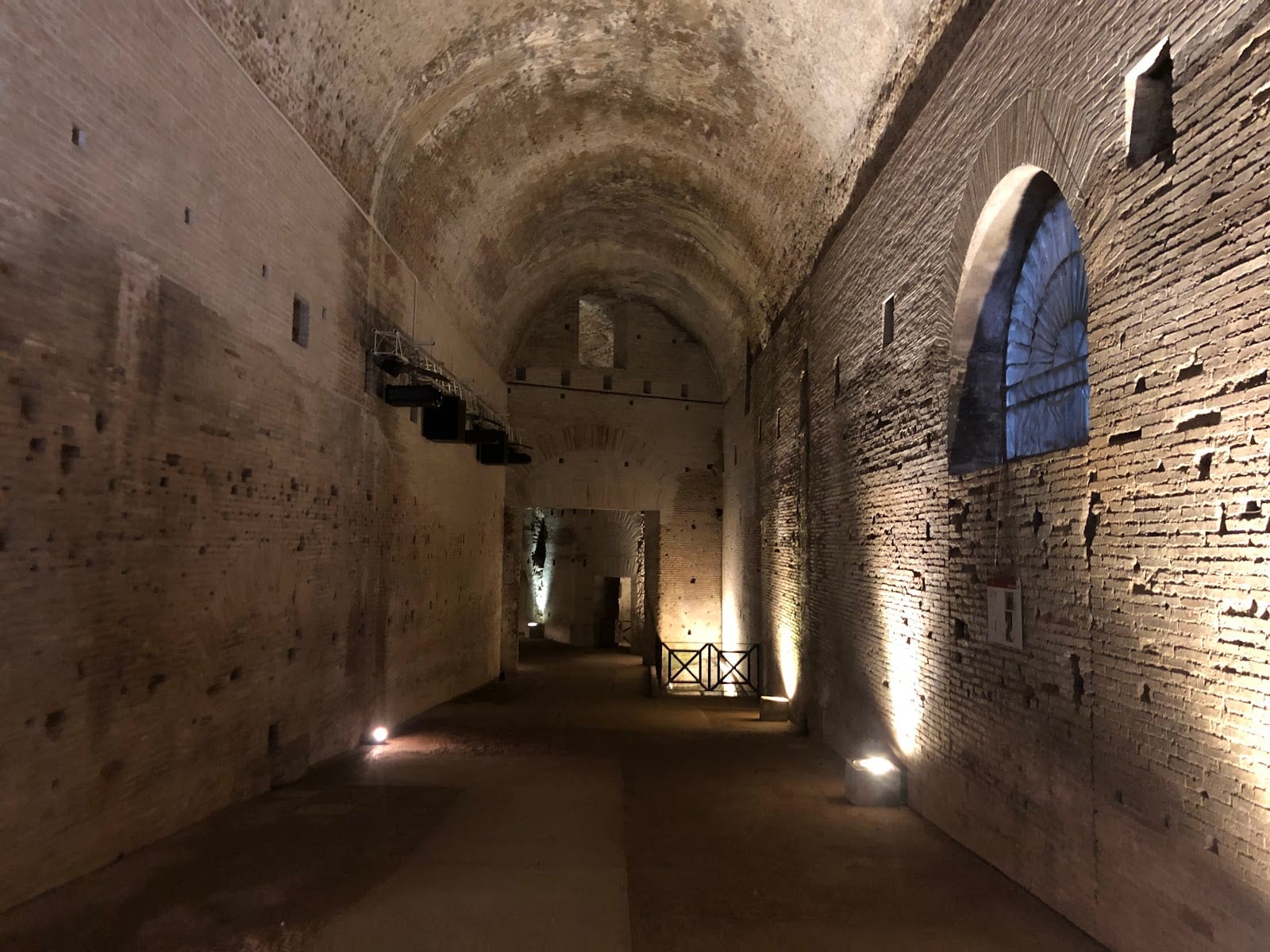 A vaulted excavated corridor inside the Domus Aurea.
