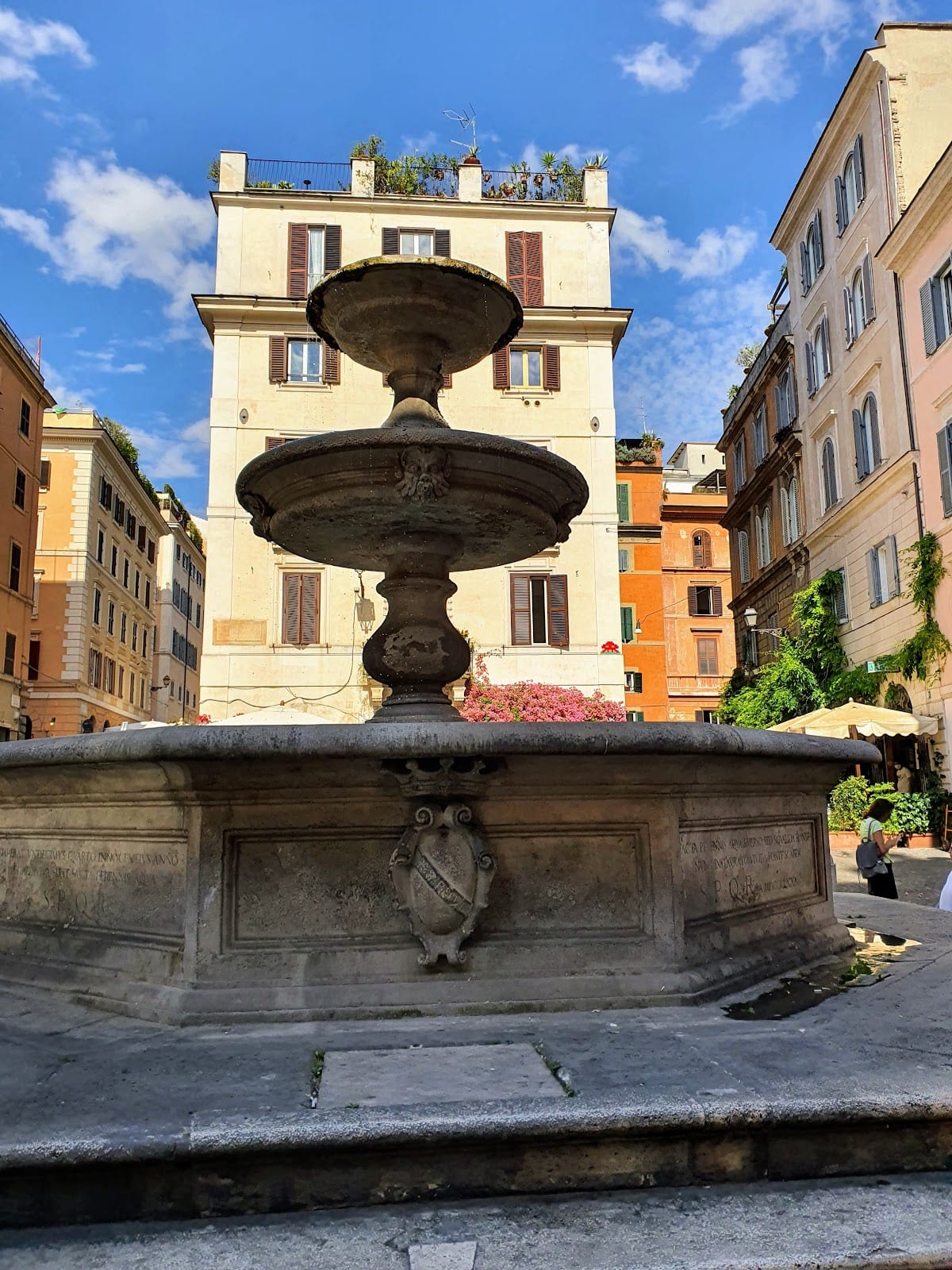 The travertine Fontana dei Catecumeni in Piazza della Madonna dei Monti.