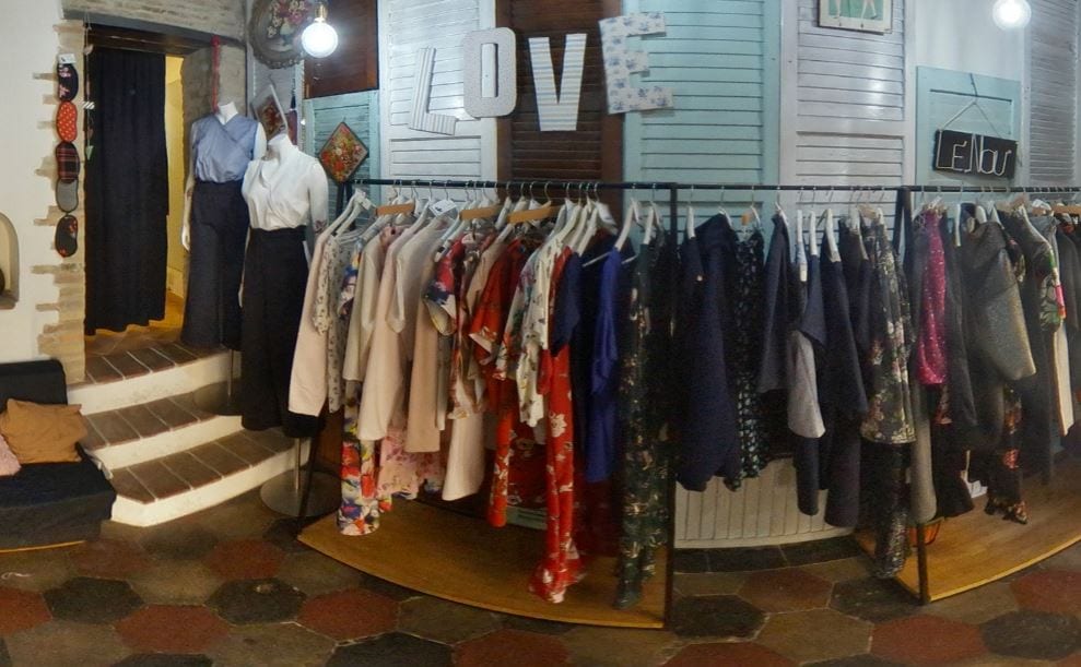 Racks of clothing inside an independent boutique in the Monti lanes.