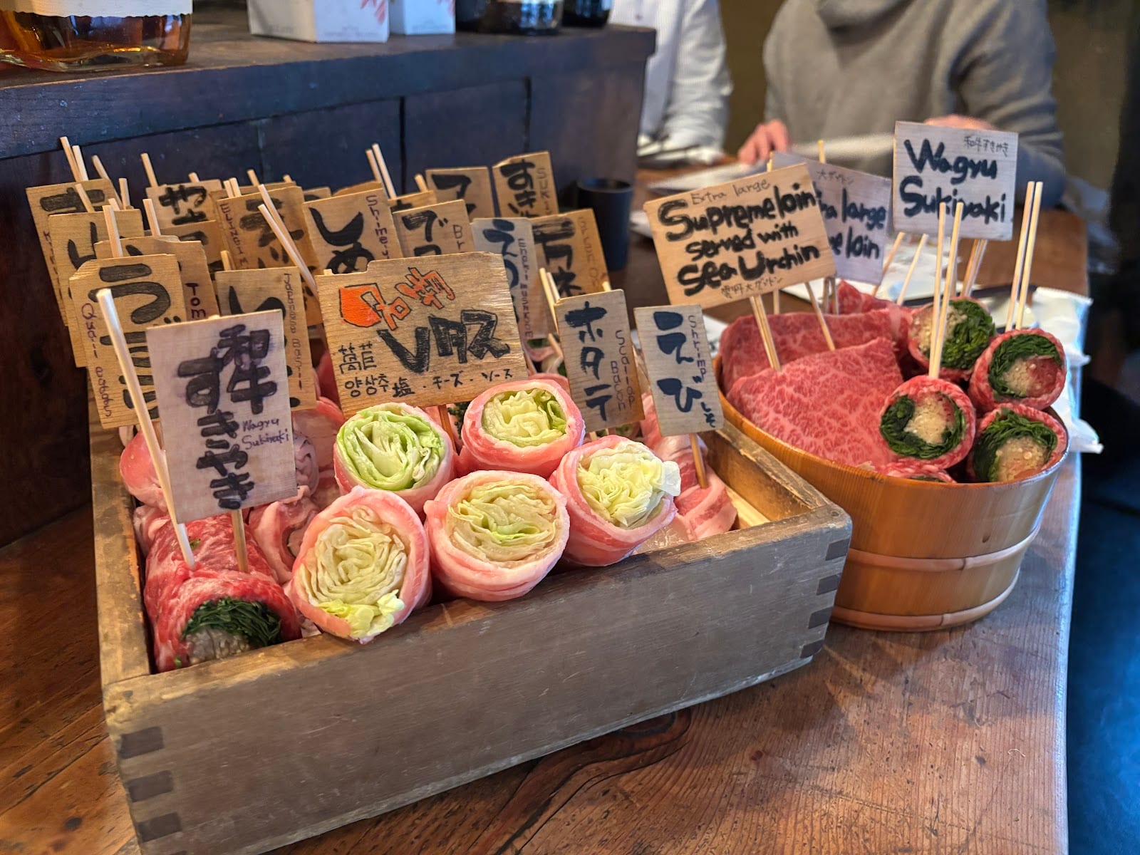 A tray of raw skewers ready for the grill at Jomon Roppongi.