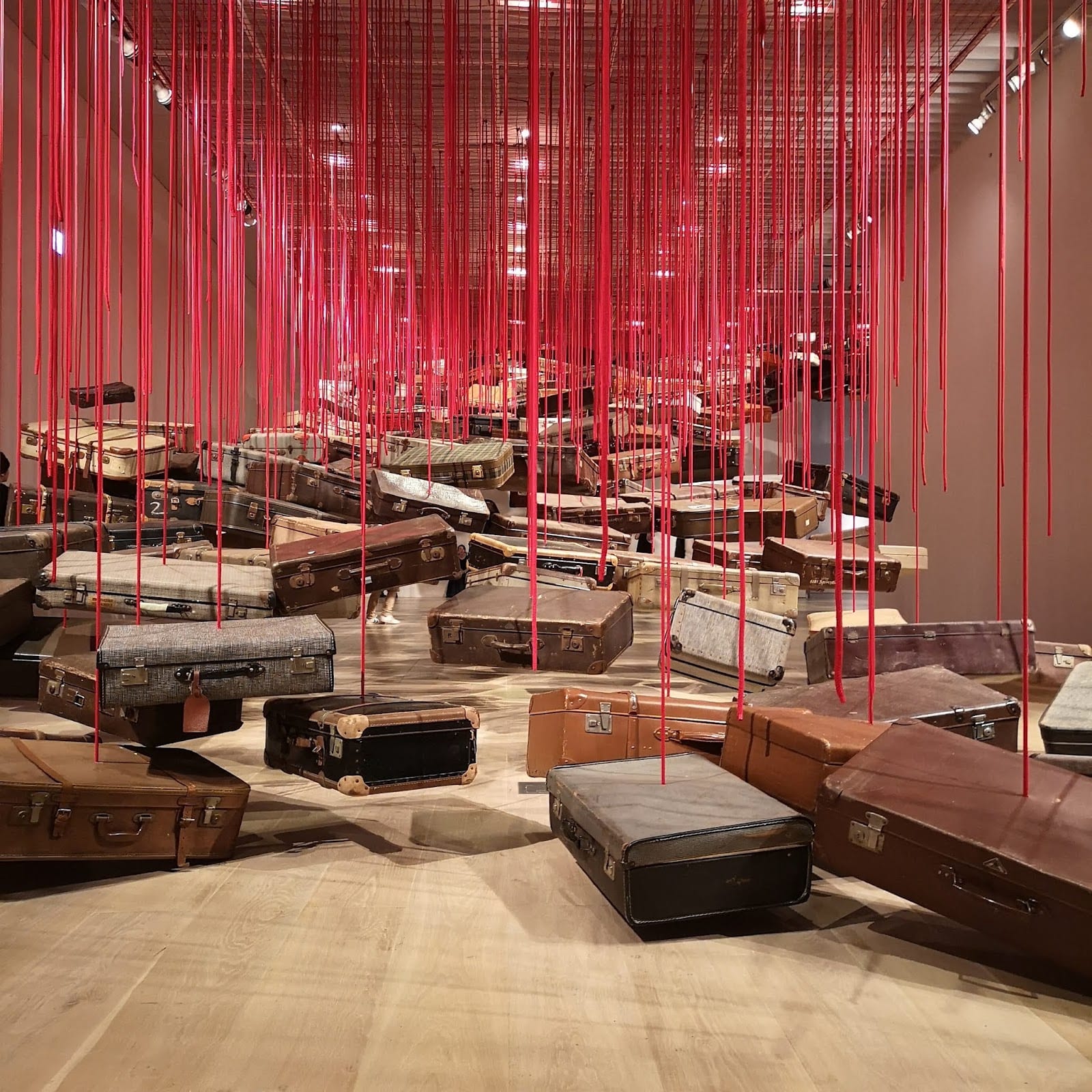 A red-thread art installation in an exhibition at the Mori Art Museum.