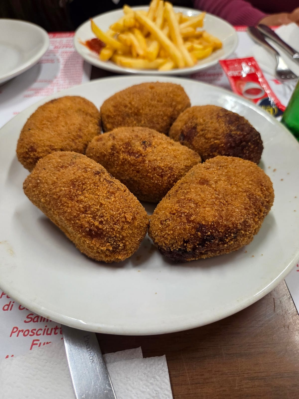 A plate of fried supplì rice balls at Pizzeria Formula 1.