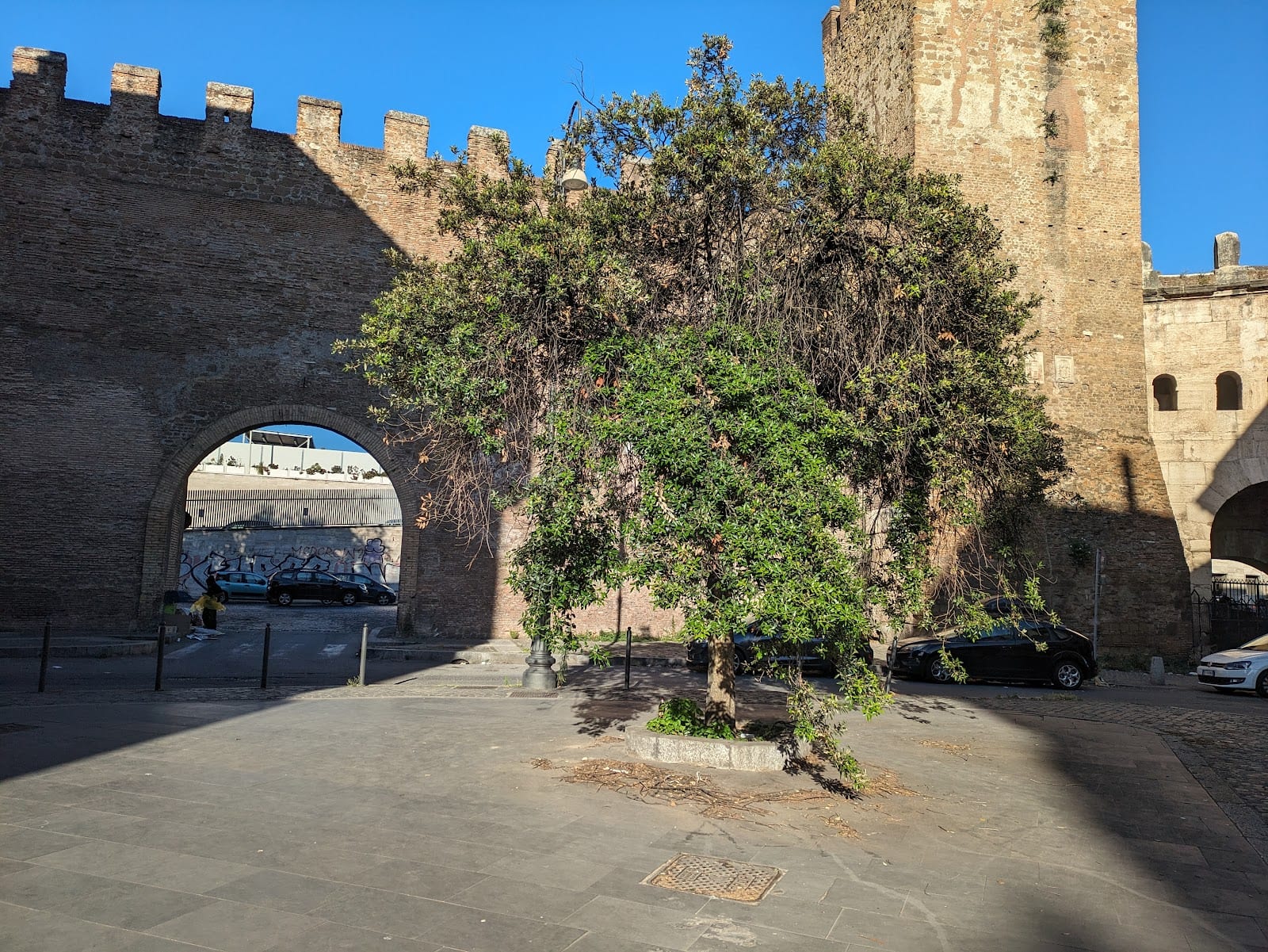 The arch of Porta Tiburtina seen from the San Lorenzo side.
