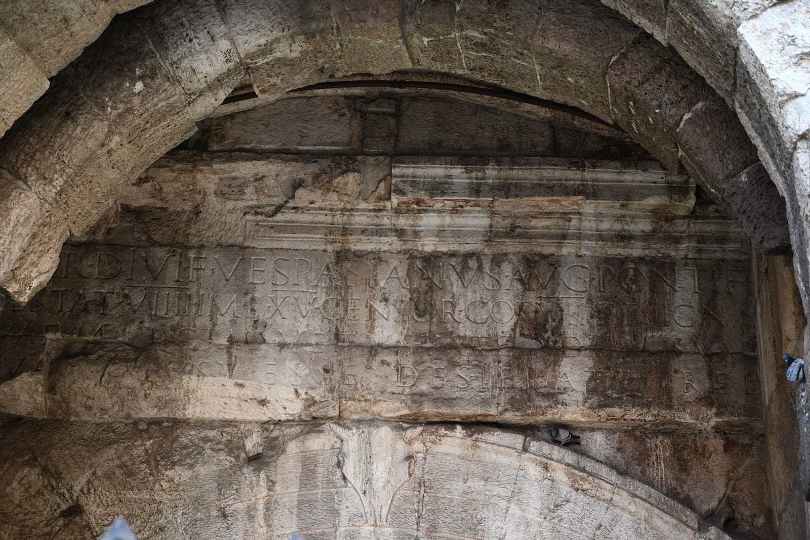 The underside of the ancient Augustan arch inside Porta Tiburtina.