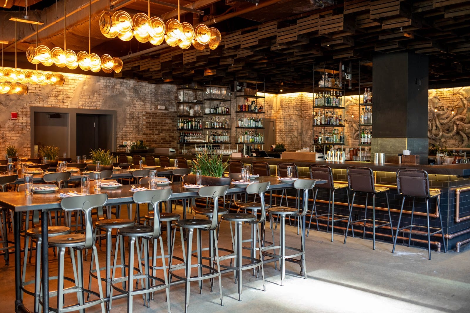 Dining room and bar at Committee on Seaport Boulevard, Boston.