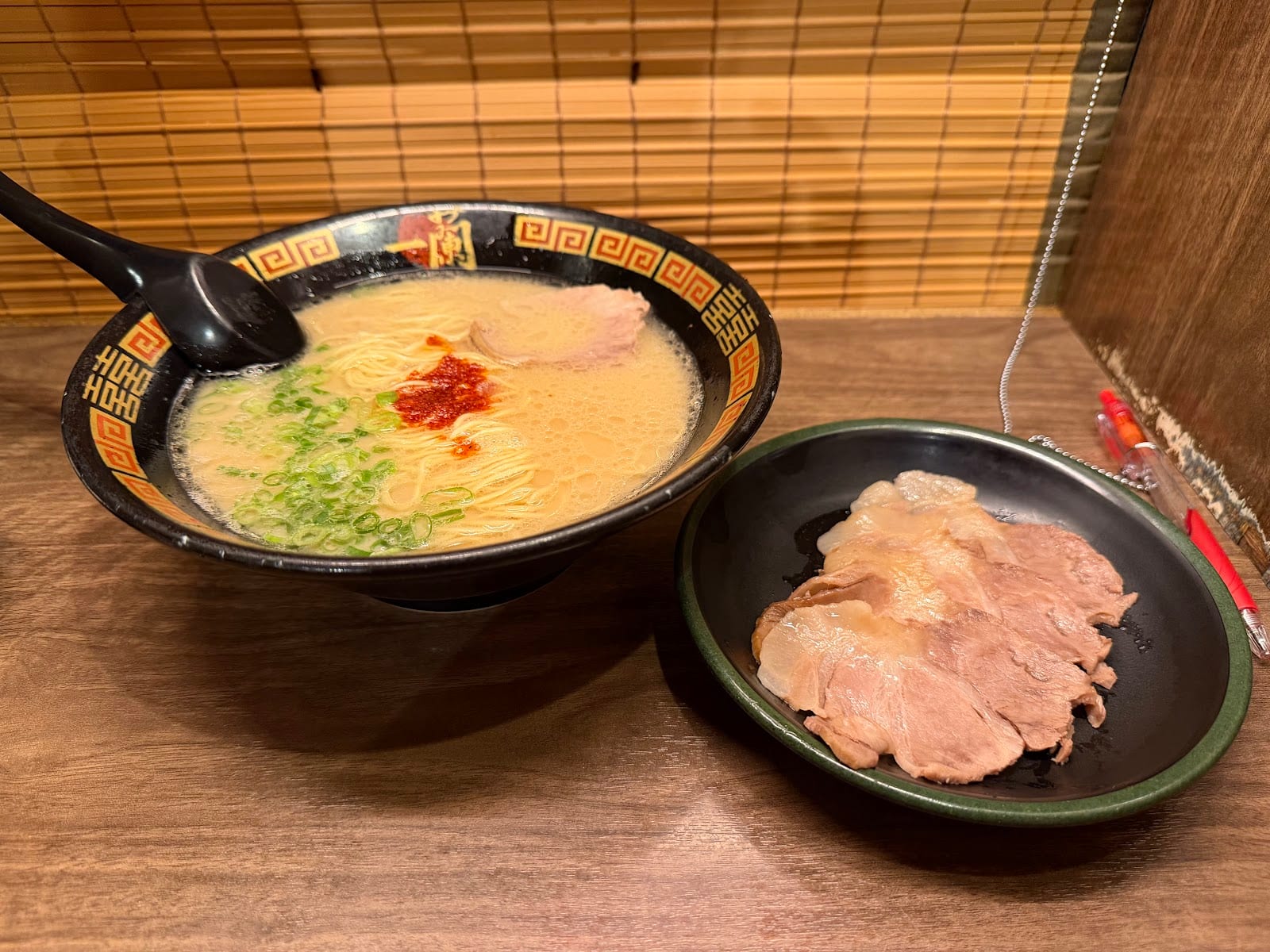 Ichiran's ramen with a side plate of chashu pork.