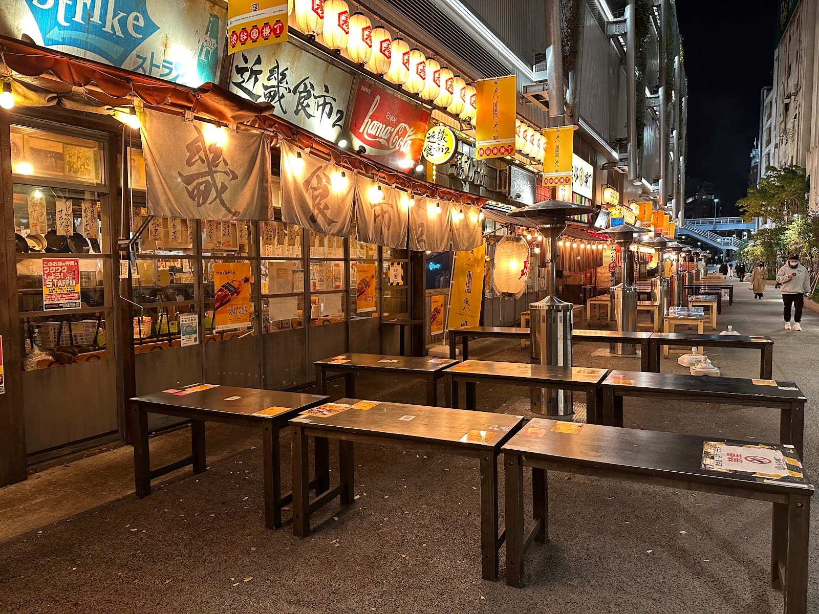The lantern-lit Shibuya Yokocho food alley below Miyashita Park.