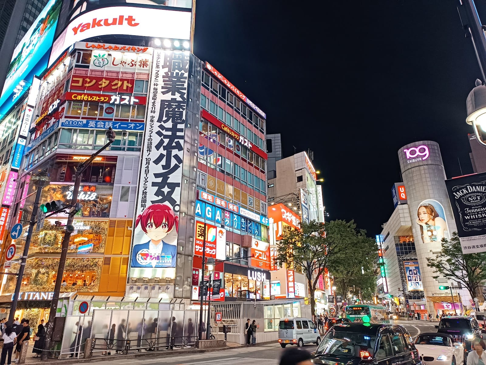 The Shibuya Scramble Crossing thronged with people.