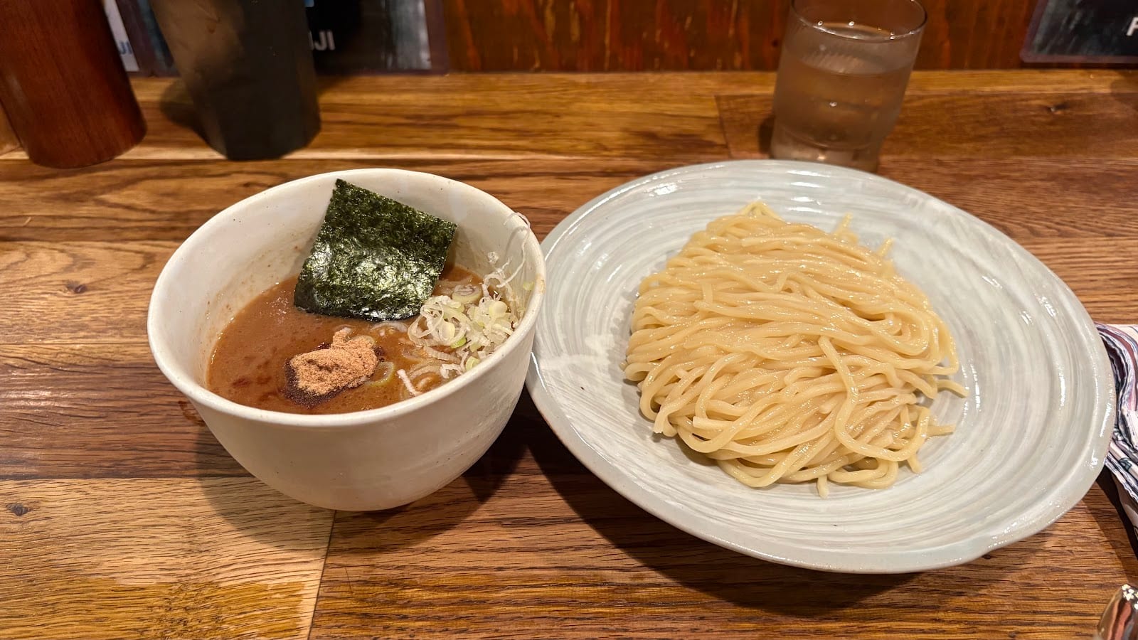 Fuunji's tsukemen: noodles beside a bowl of rich dipping broth.