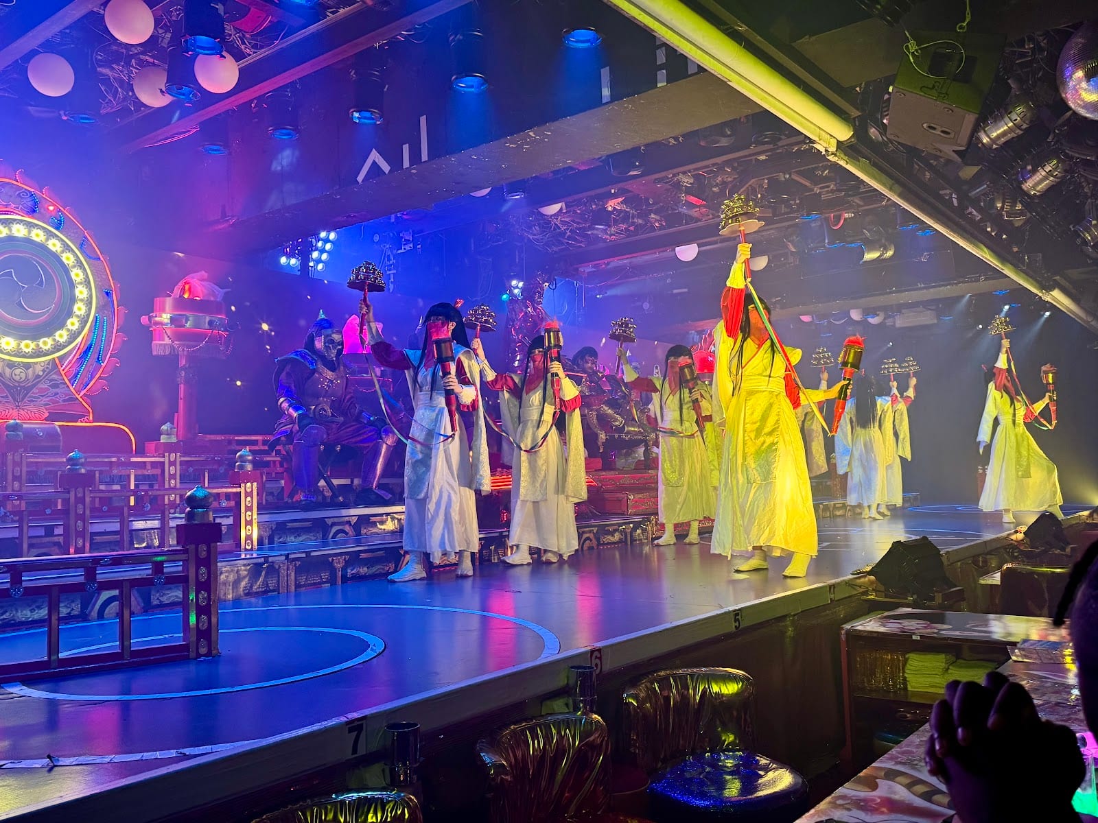 Costumed dancers under the lights at the Samurai Restaurant.