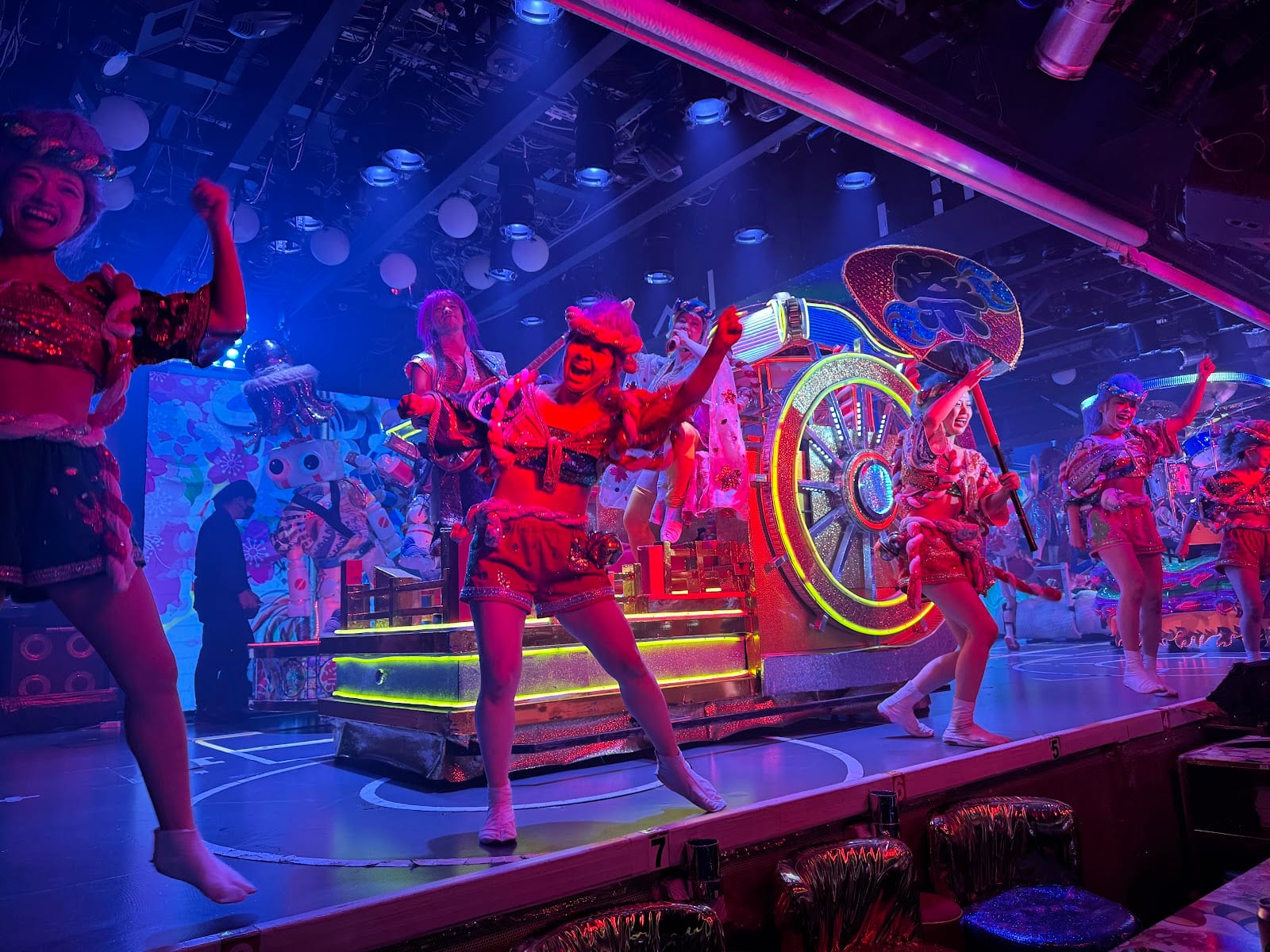 Performers and a giant drum on stage at the Samurai Restaurant show.