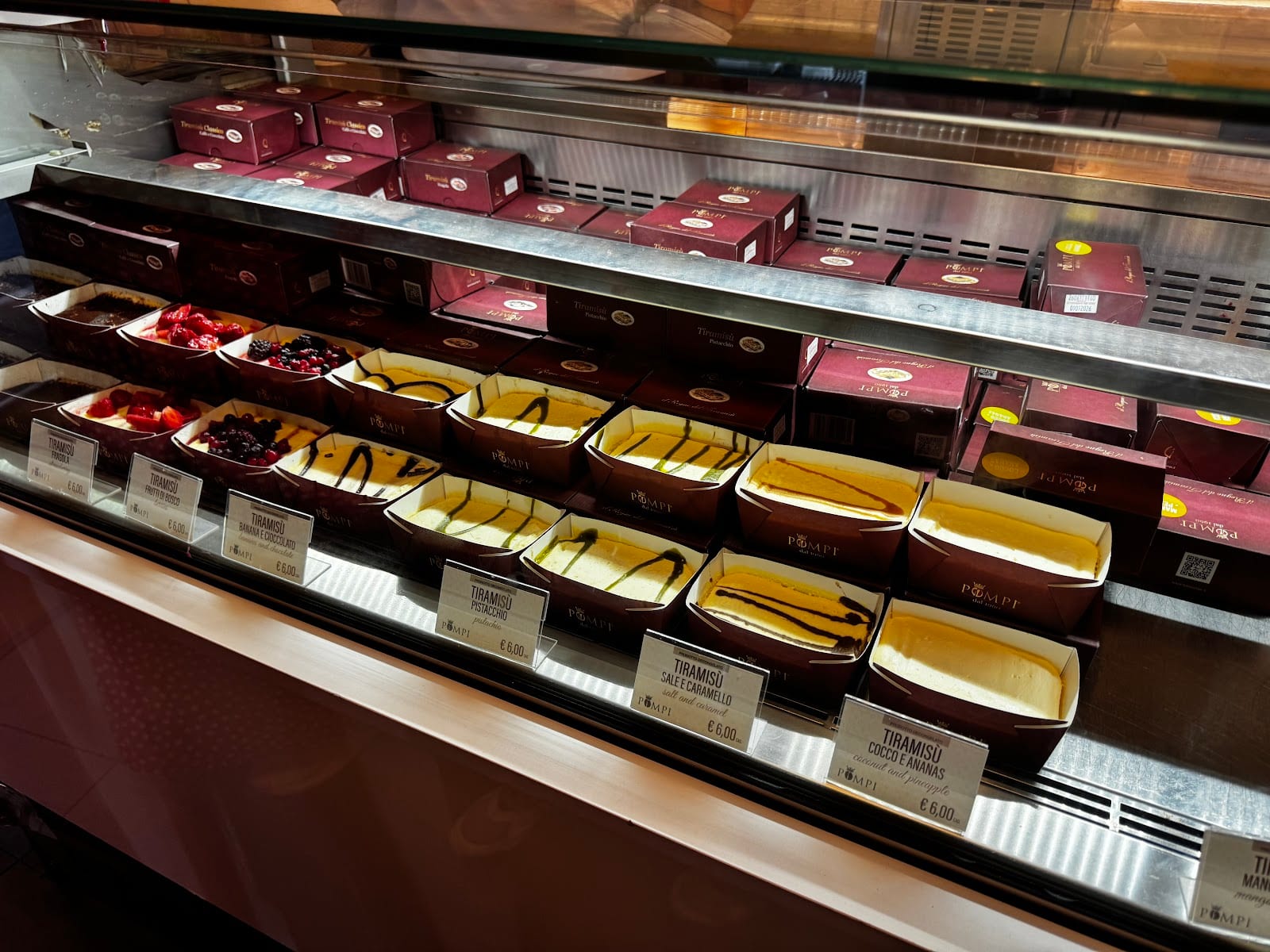 The display case of tiramisu at Pompi.