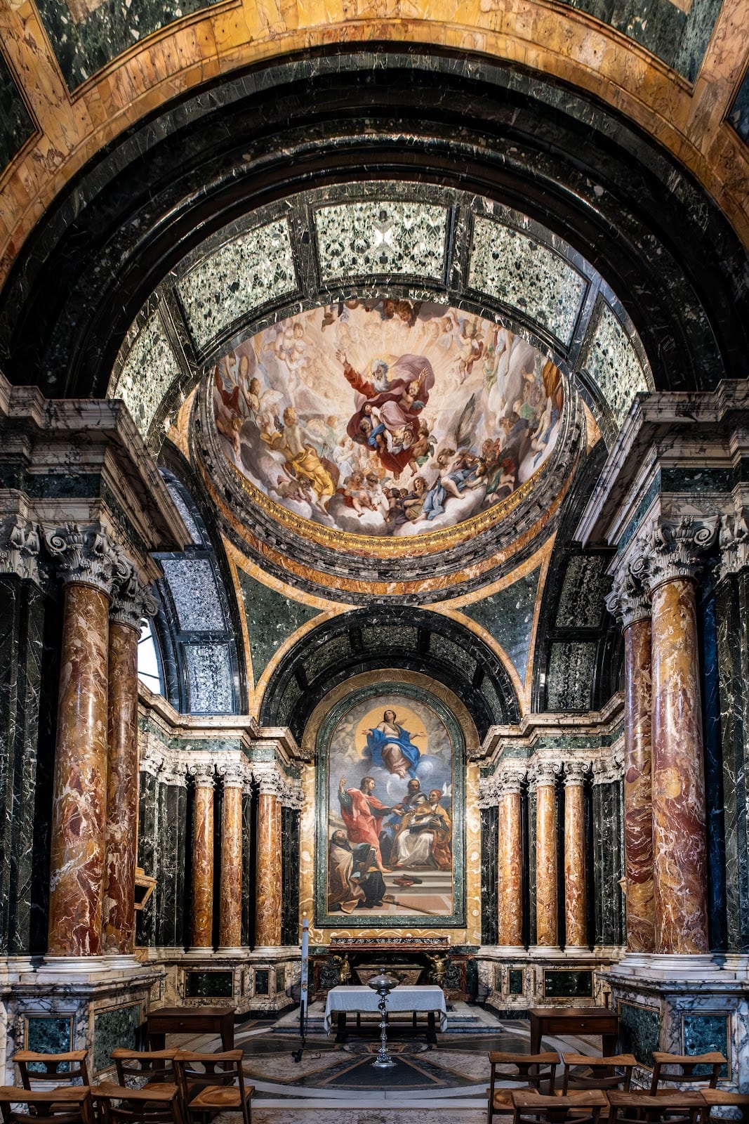 The gilded frescoed dome and apse of Santa Maria del Popolo.