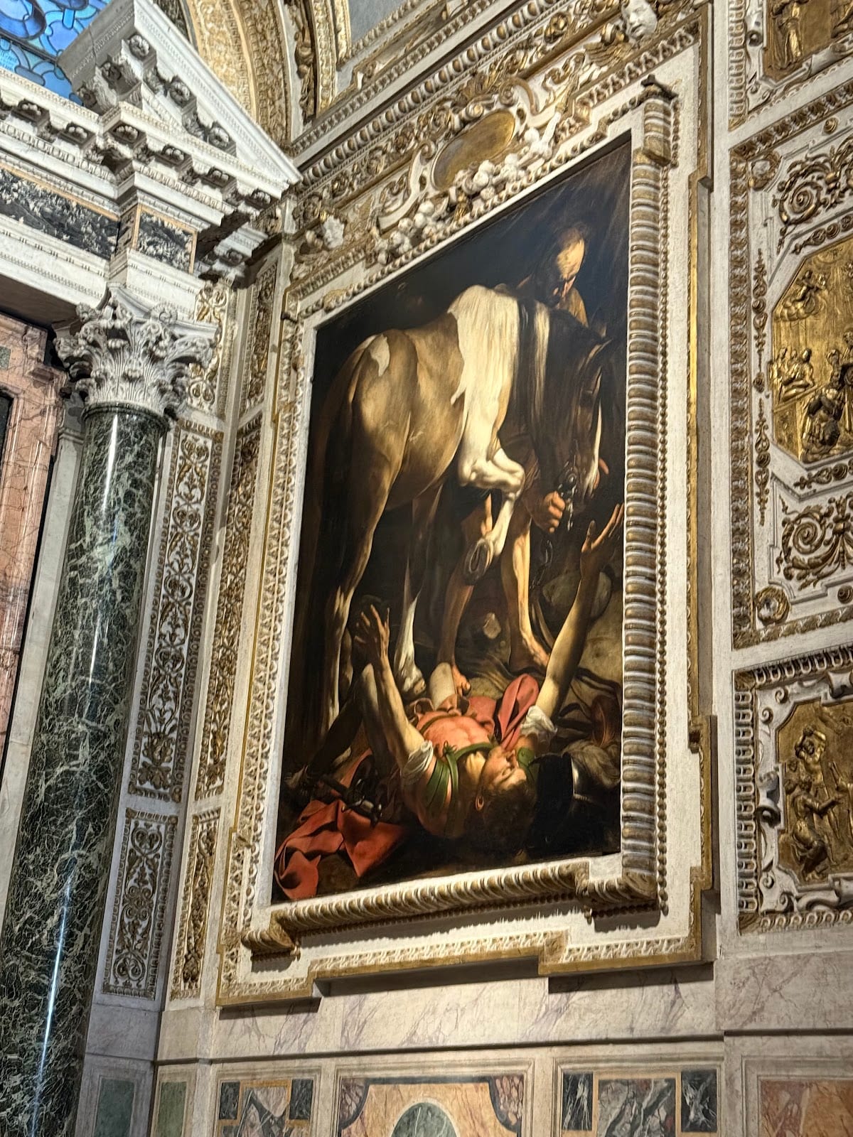 Caravaggio's Crucifixion of Saint Peter in Santa Maria del Popolo.