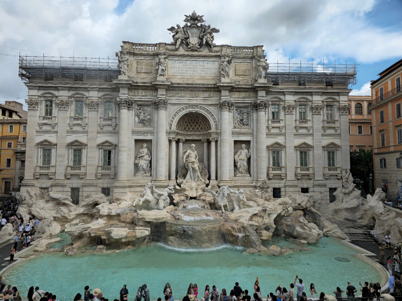 The Trevi Fountain seen head-on in daylight.