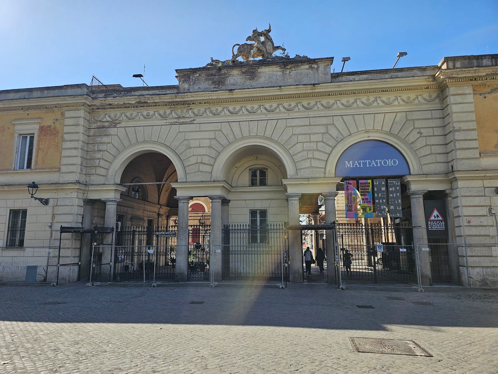 The main gate of the Mattatoio, topped by a sculpted ox, in Testaccio.