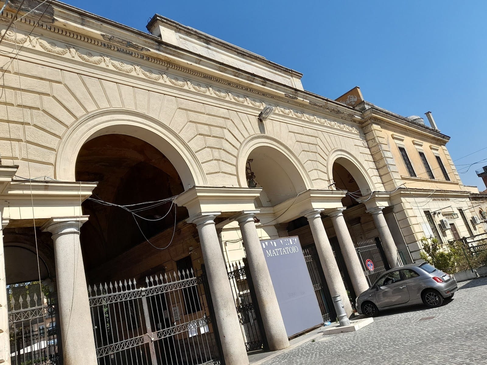 The columned travertine facade of the Mattatoio in Testaccio.