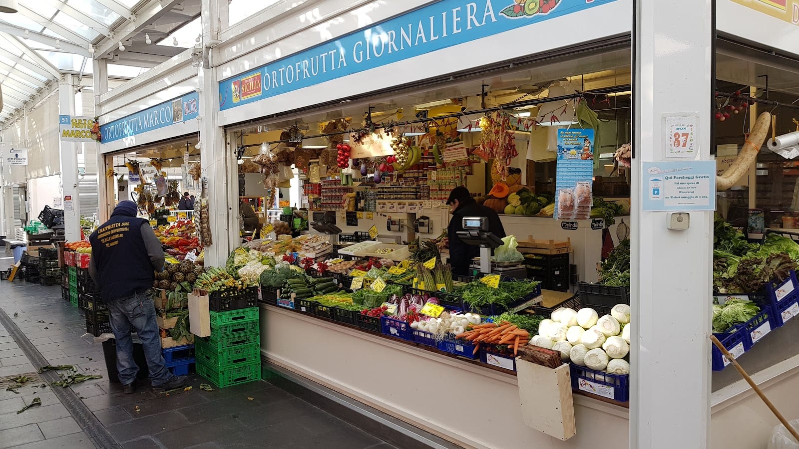 A produce stall piled with fruit and vegetables at the Testaccio market.