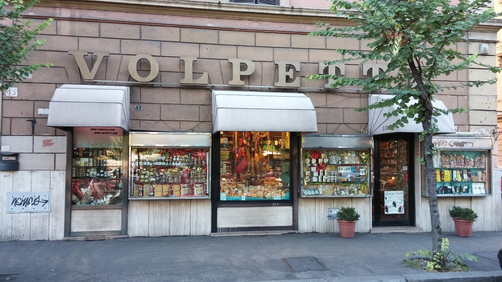 The awninged Volpetti delicatessen shopfront on Via Marmorata in Testaccio.